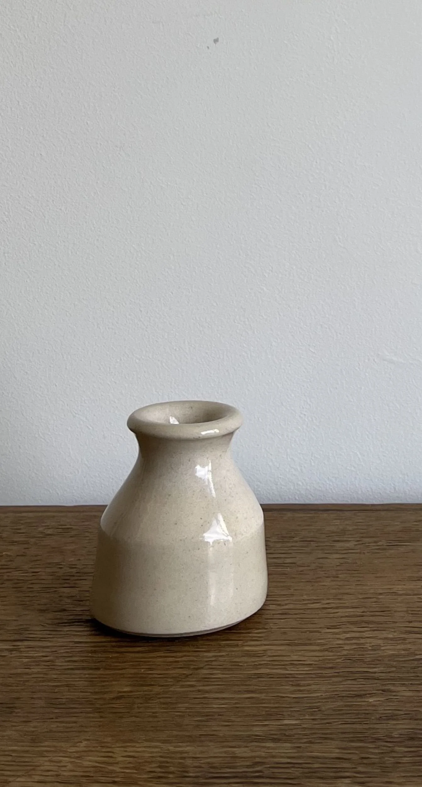 hand made stoneware bud vase in a neutral tone