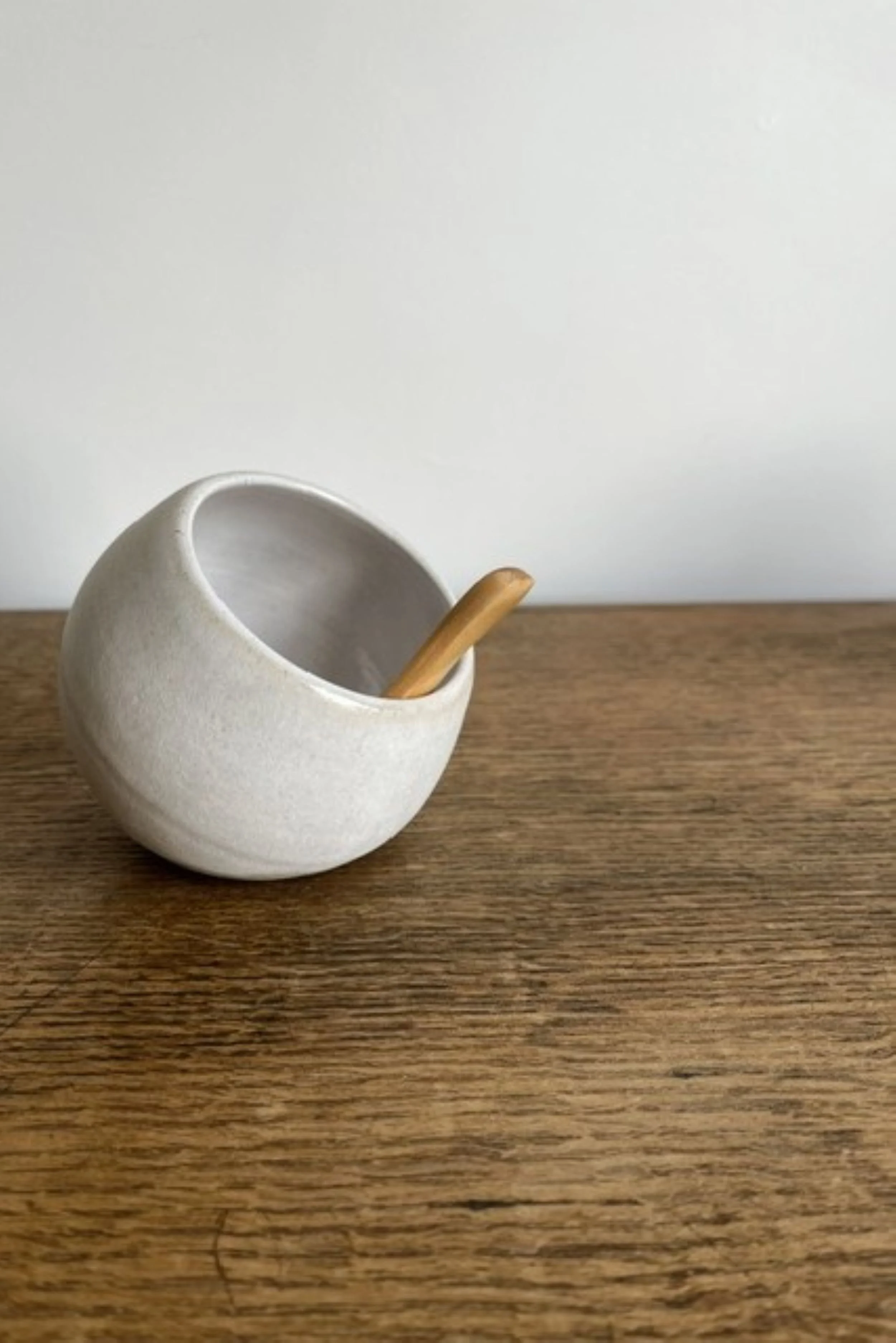 Handmade Stoneware Salt Pig White with light spoon.