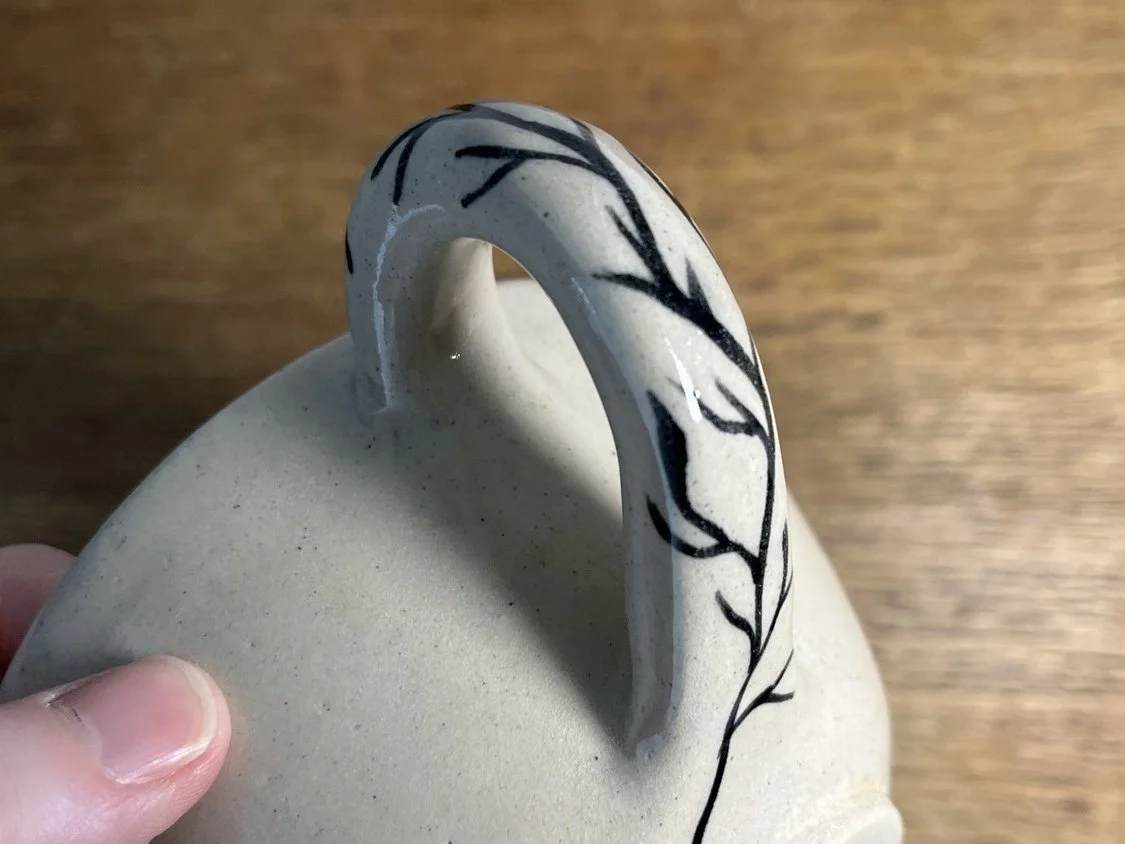 Decorative handle of handmade ceramic mug