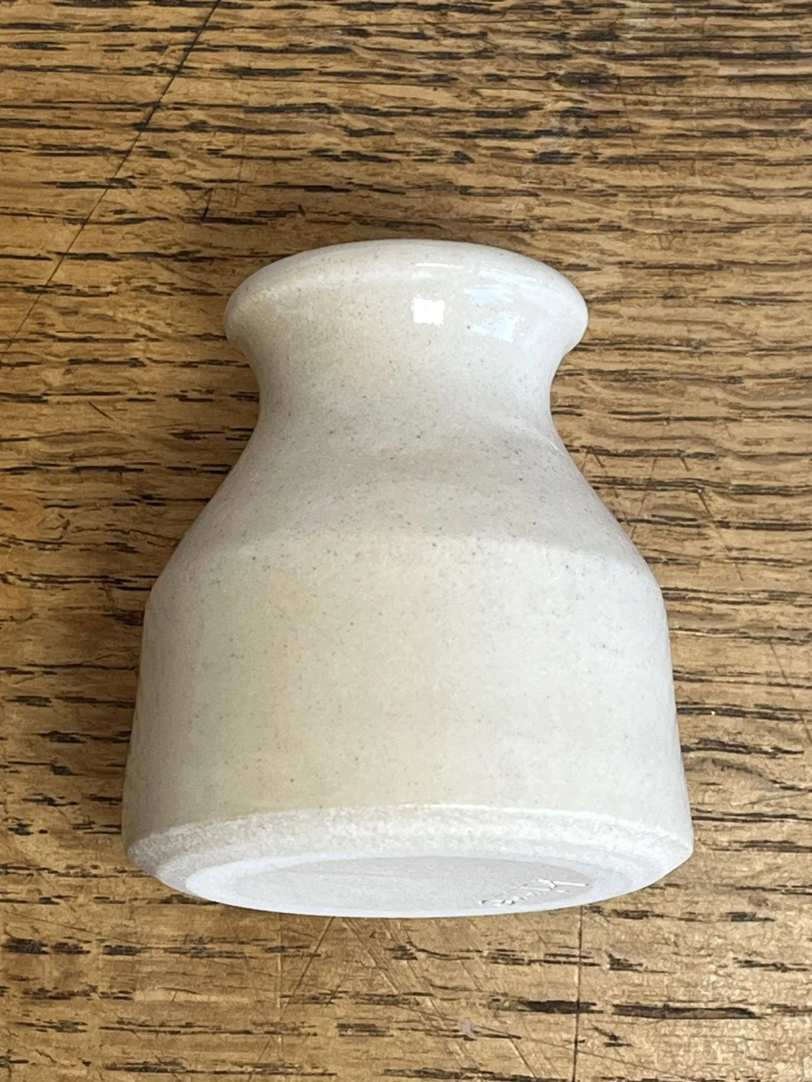 hand made stoneware bud vase in a neutral tone