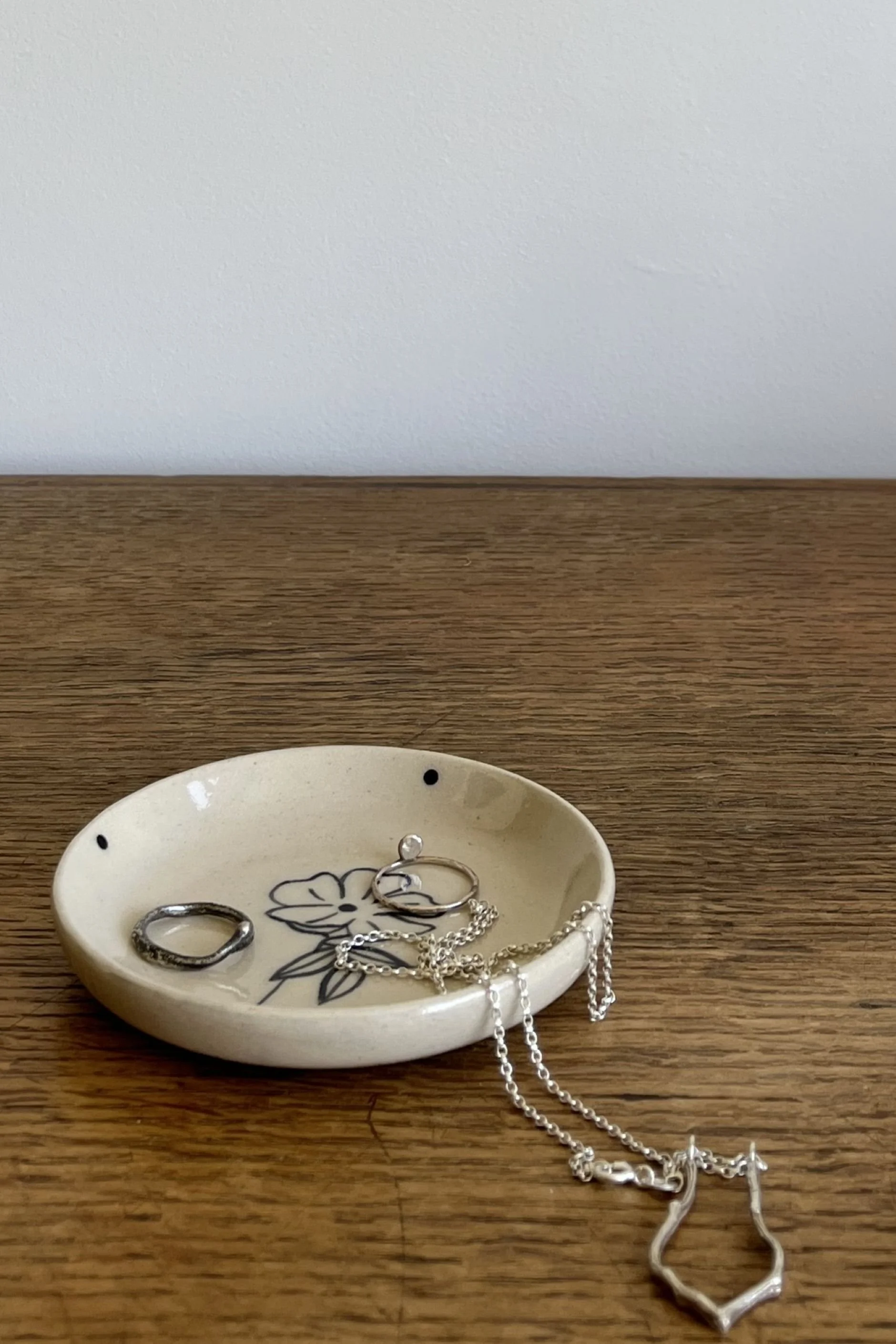 Handmade Stoneware Trinket Dish with Flower Design with Jewellery.
