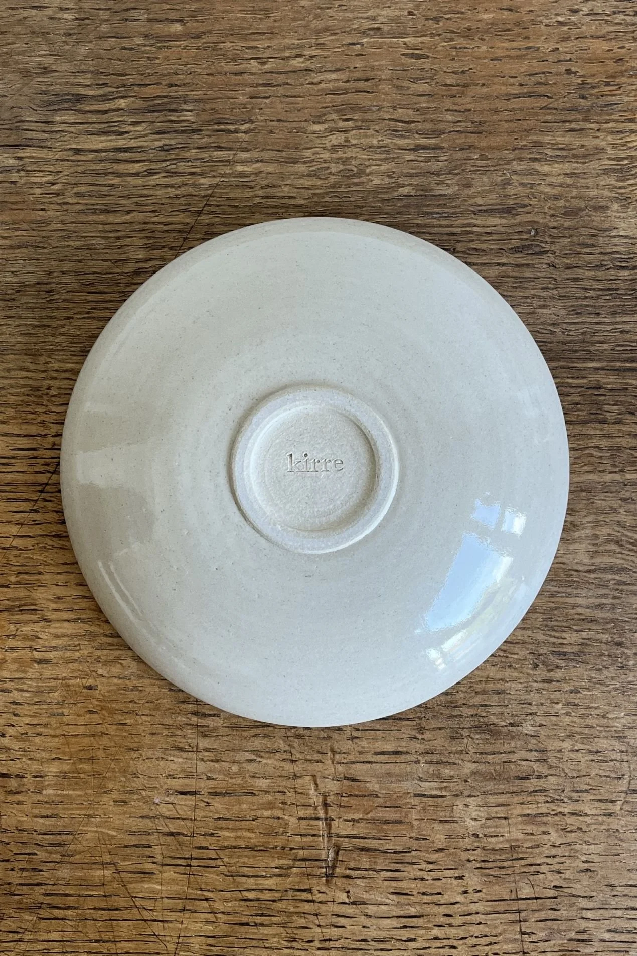 Handmade Stoneware Dish with Flower Design.