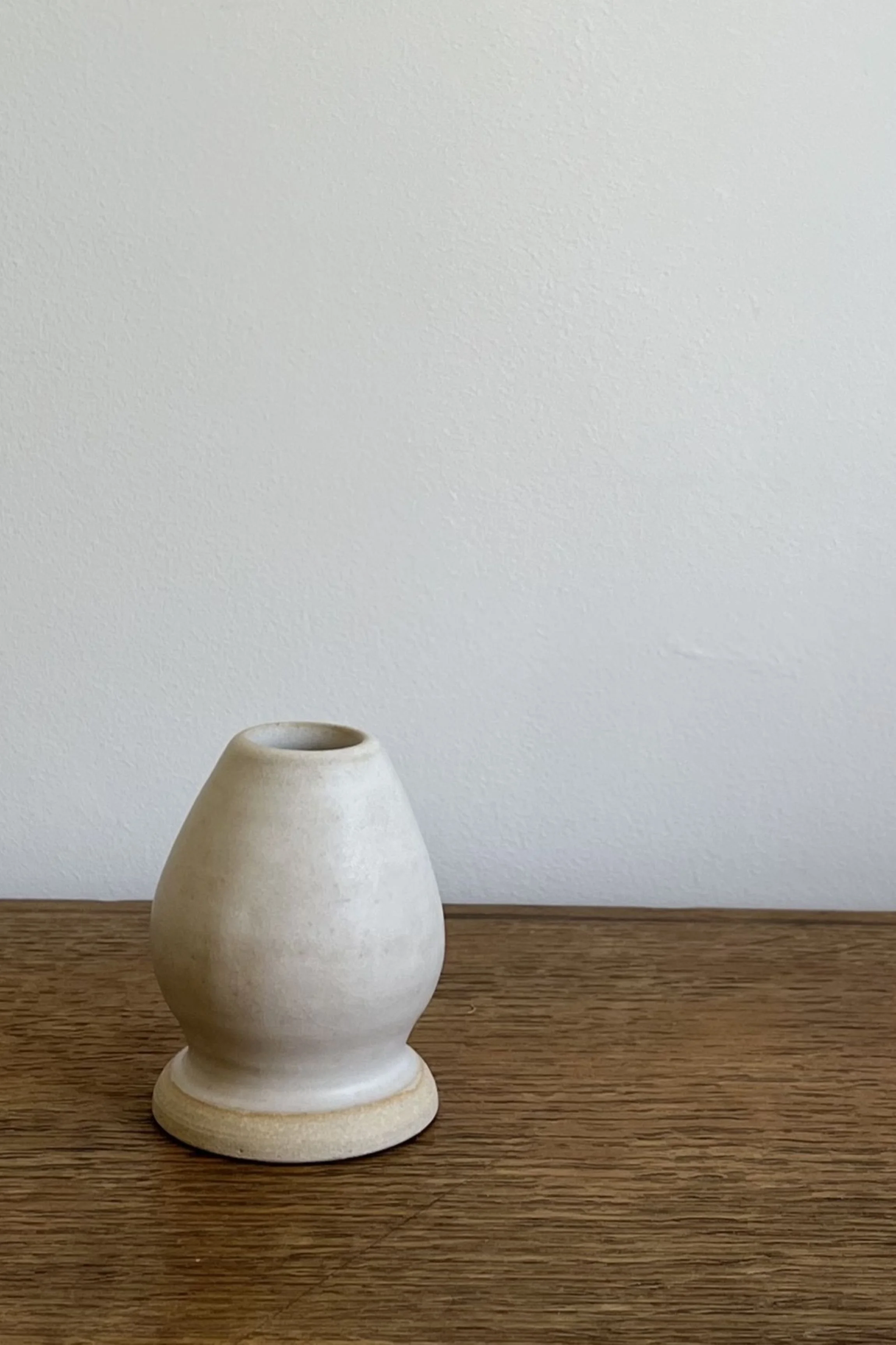 Handmade Stoneware Match Whisk Holder in an off-white glaze.
