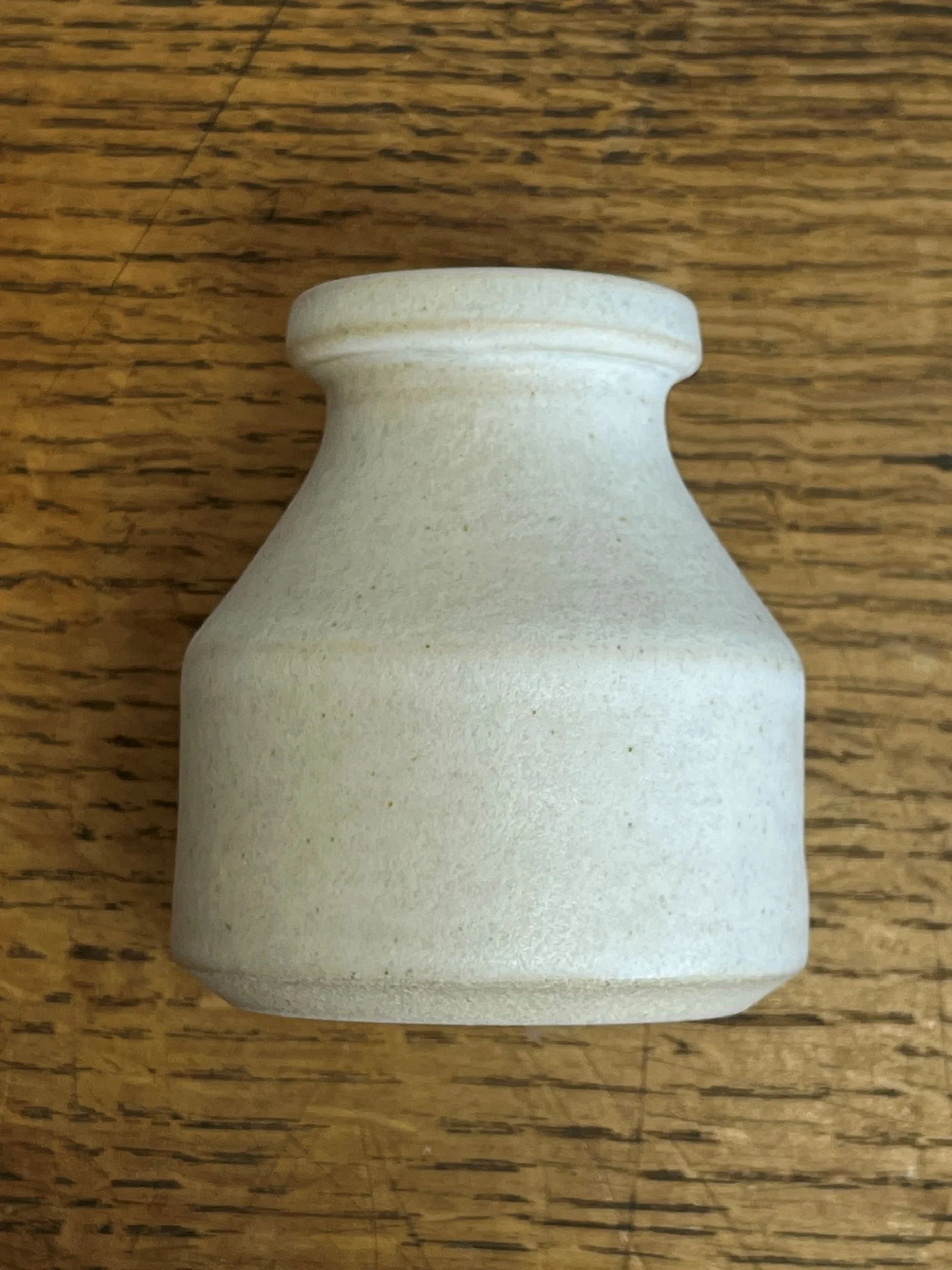 hand made stoneware bud vase in a Matt White Glaze