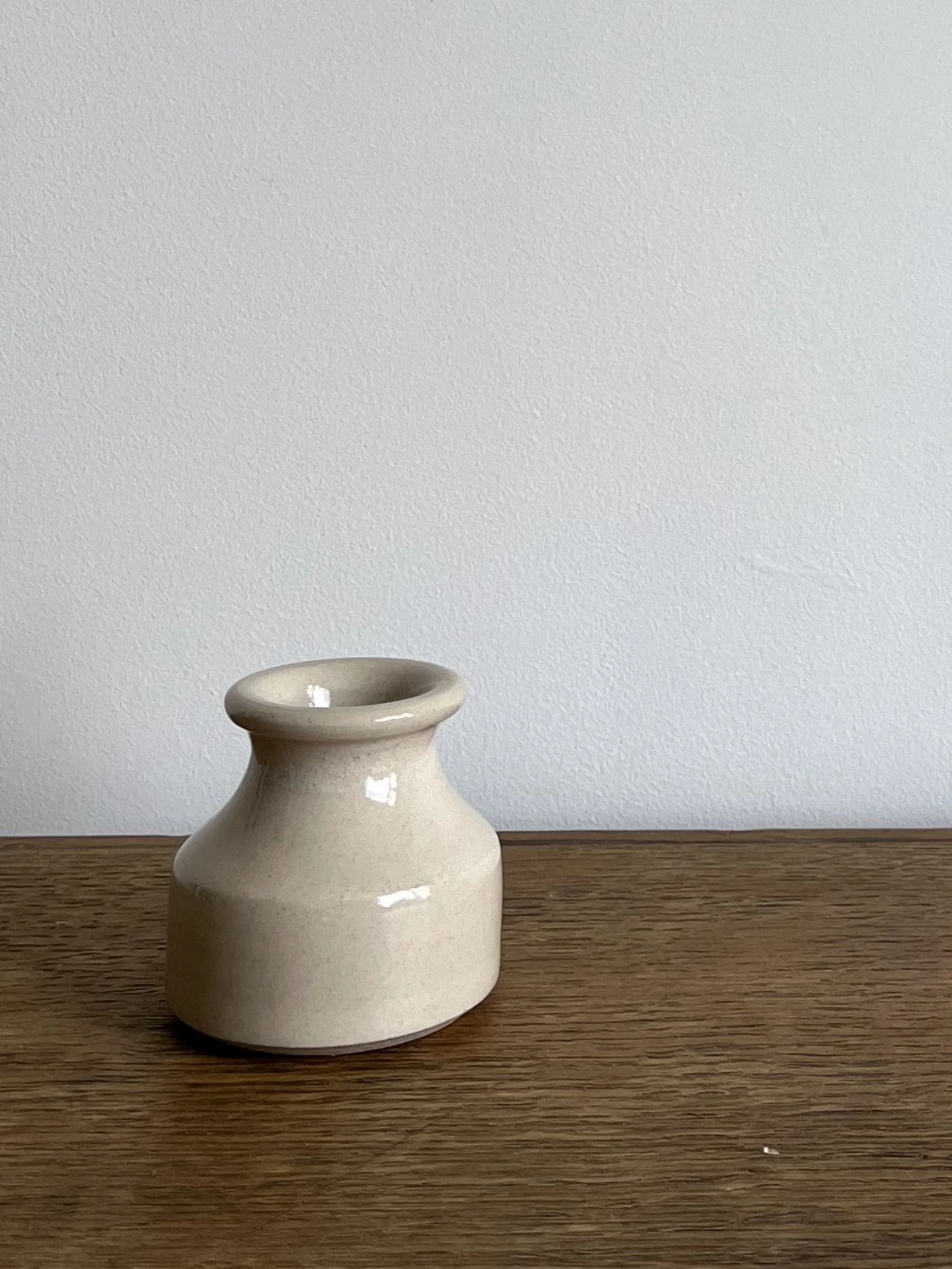 hand made stoneware bud vase in a neutral tone