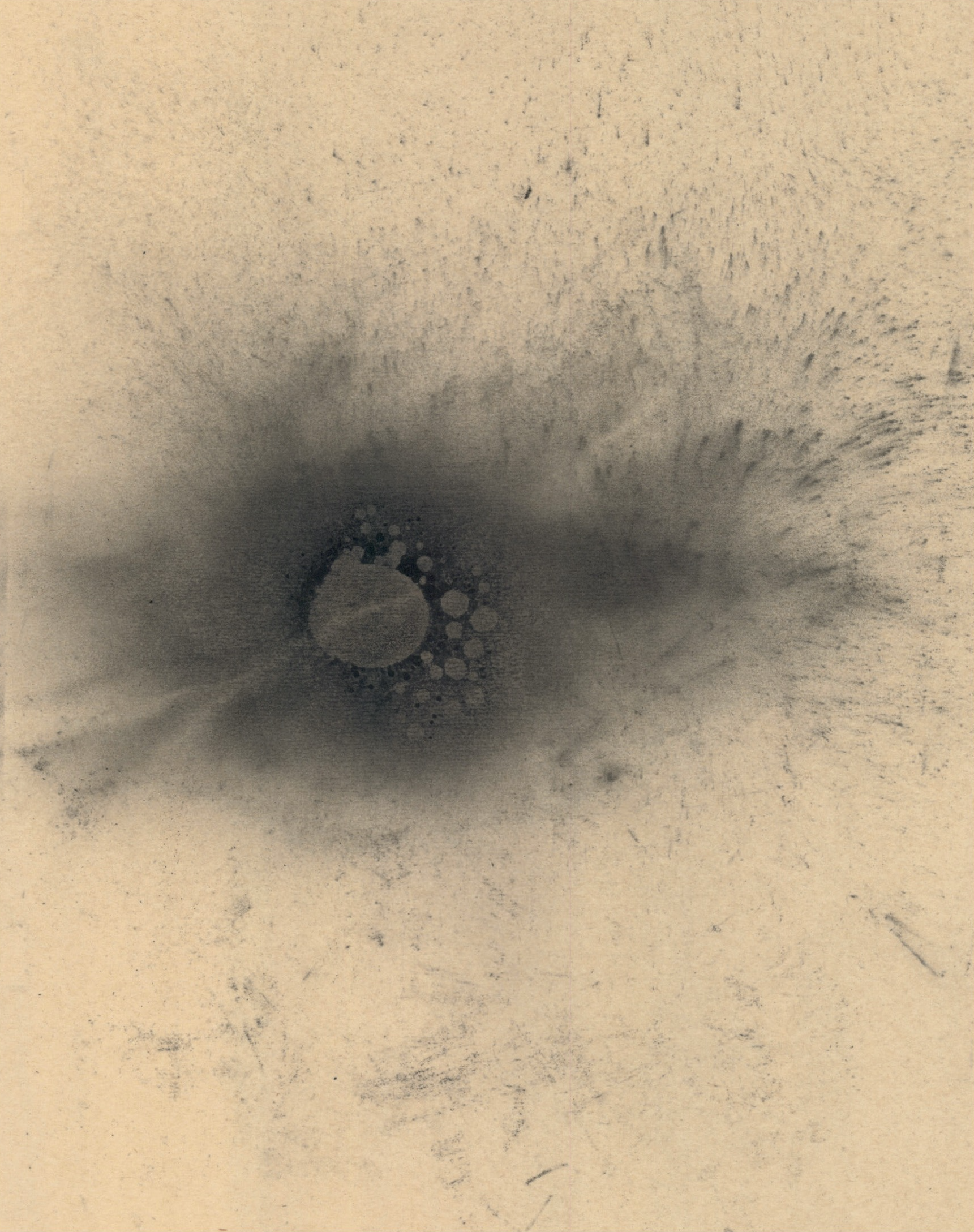 light beige canvas with dark splodges of charcoal powder and circular spots of what looks like ink