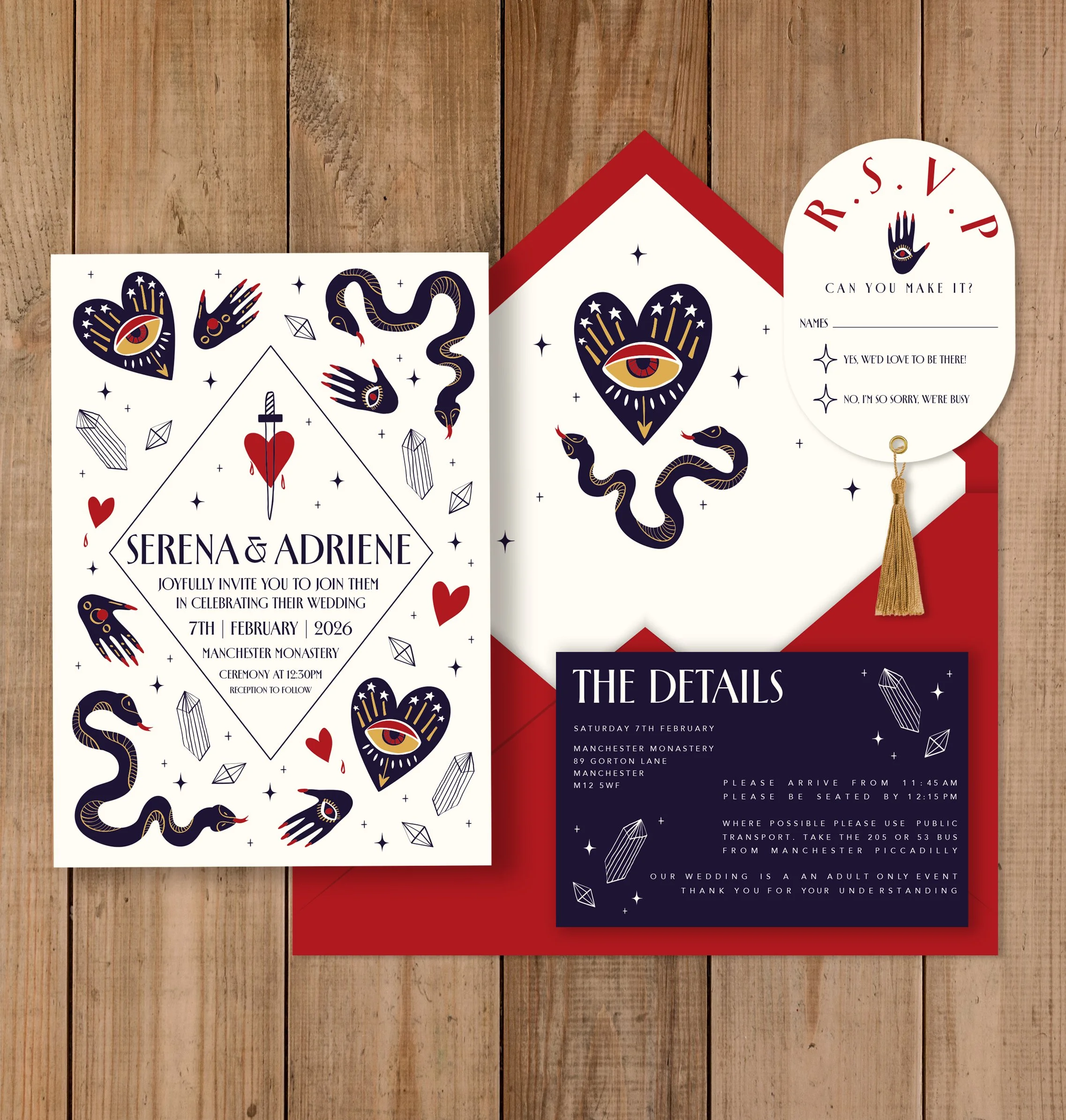 Tattoo-inspired wedding invitation with dark hearts, snakes, and eyes, featuring Serena and Adrienne's names, wedding date, location, and details, set against a wooden background.