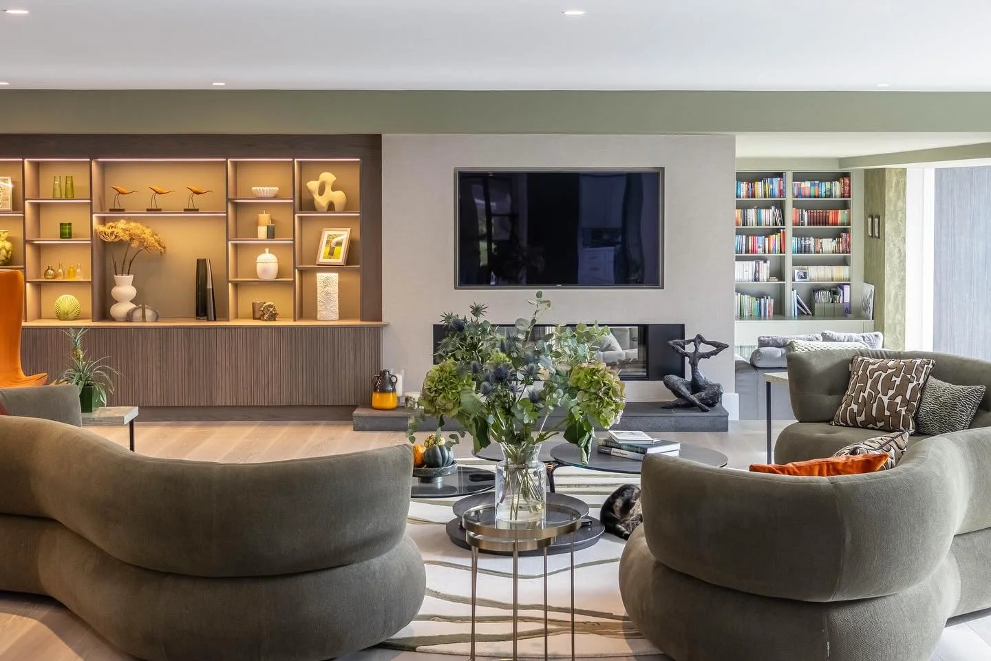 With the scale of this room and the home&rsquo;s natural flow in mind, we chose a sofa that looks beautiful from every angle - the Roche Bobois &lsquo;Sense&rsquo;. It&rsquo;s sculptural form guides you naturally through the space without feeling obs