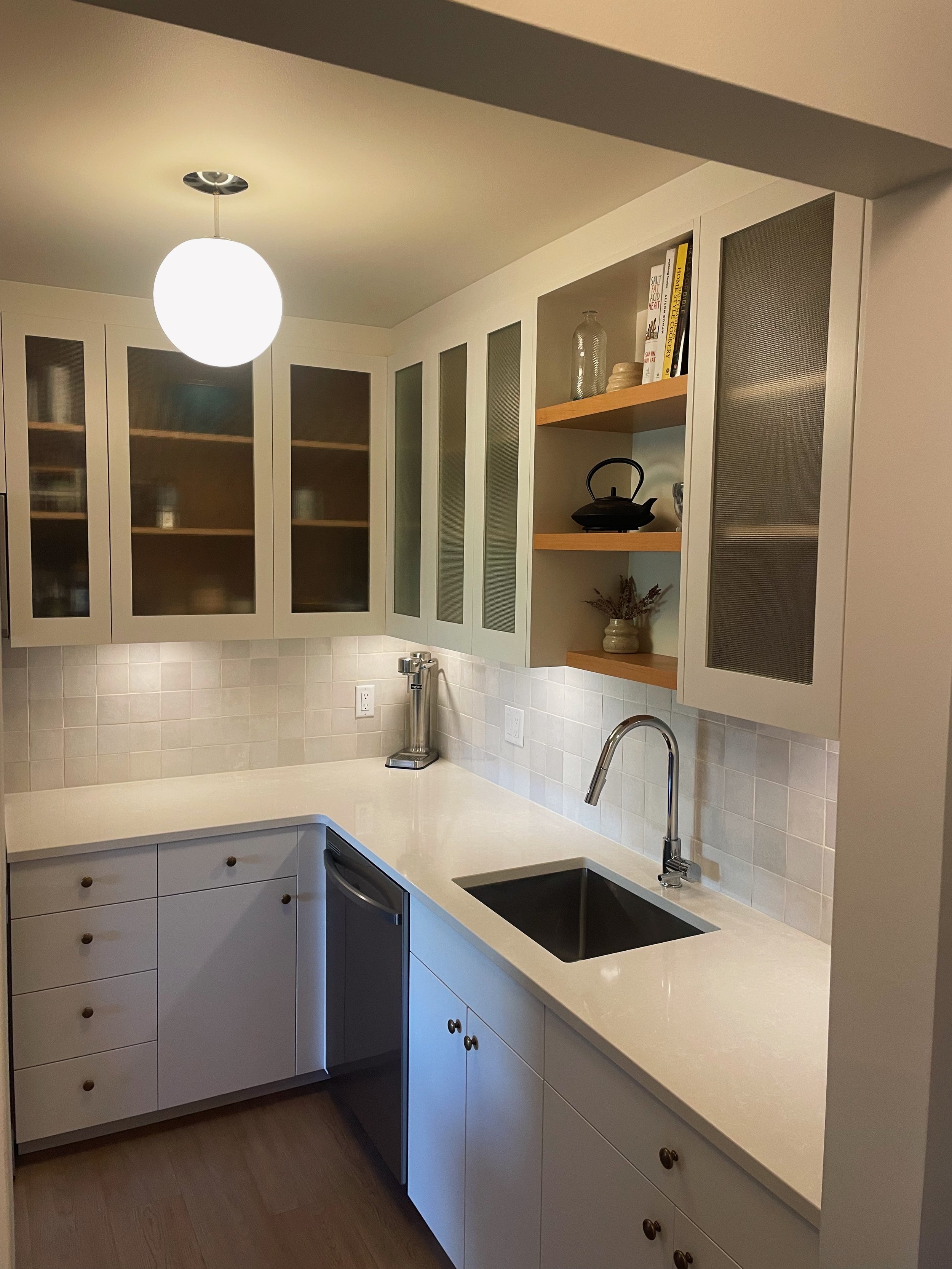 Custom kitchen renovation with bespoke cabinetry by Herringbone Contracting, Kitsilano, Vancouver