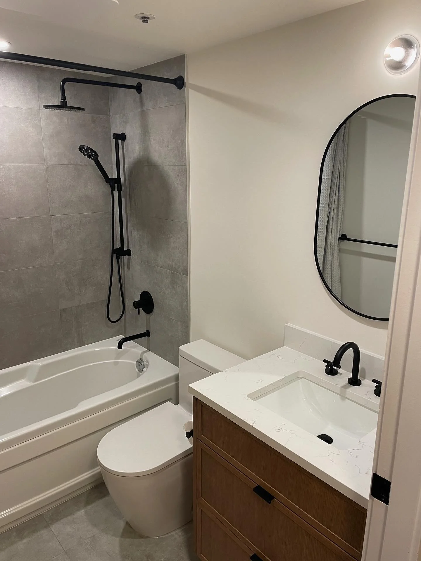 Fully revamped Coal Harbour washroom with oak accents. 1 of 2 renovated washrooms in this beautiful condo.