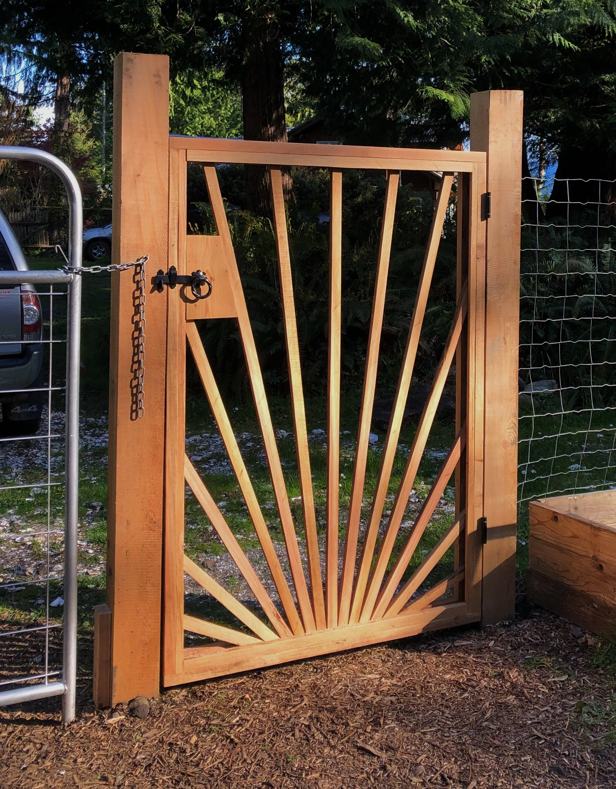 Handcrafted wooden fence gate built with precision and care by Herringbone Contracting, Vancouver