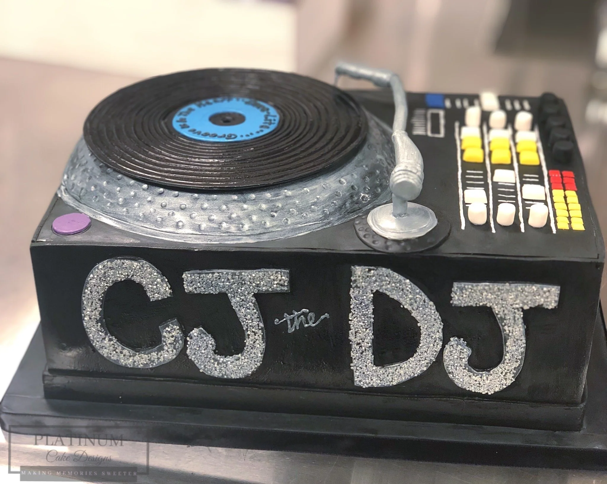 DJ Spinning Turntable Birthday Cake on-site.JPG