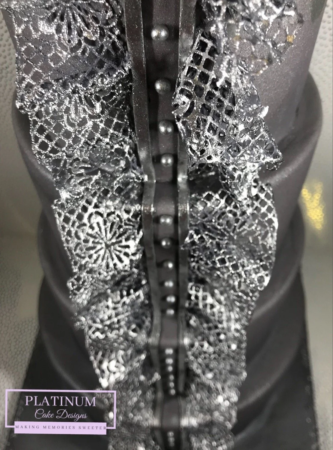 4-tier silver lace and gray wedding cake.JPG