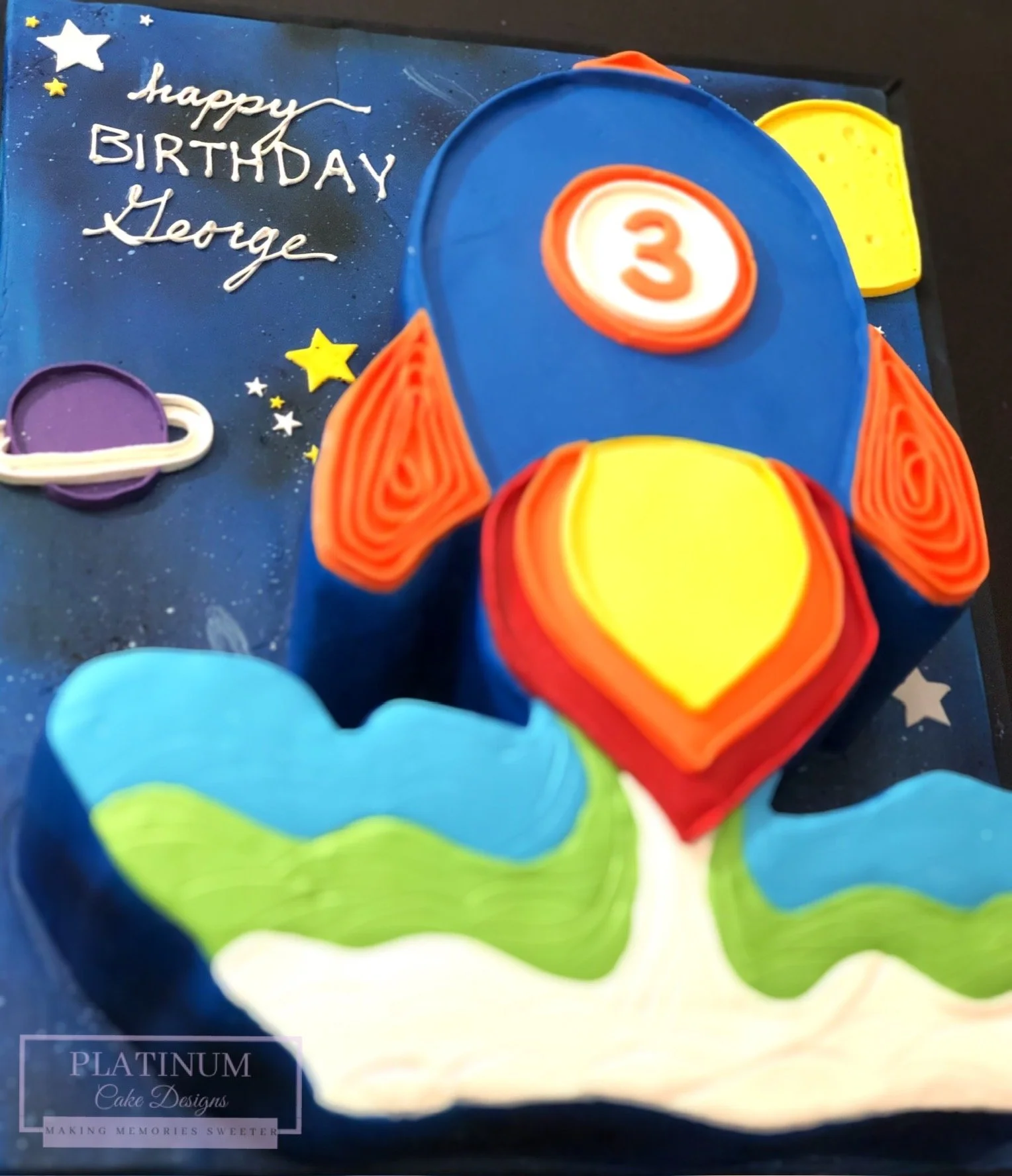 3rd birthday rocket ship sculpted cake side.JPG