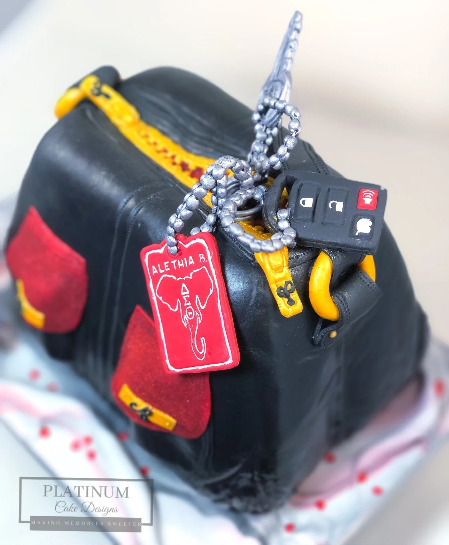 60th Birthday sculpted purse Delta cake top.jpg