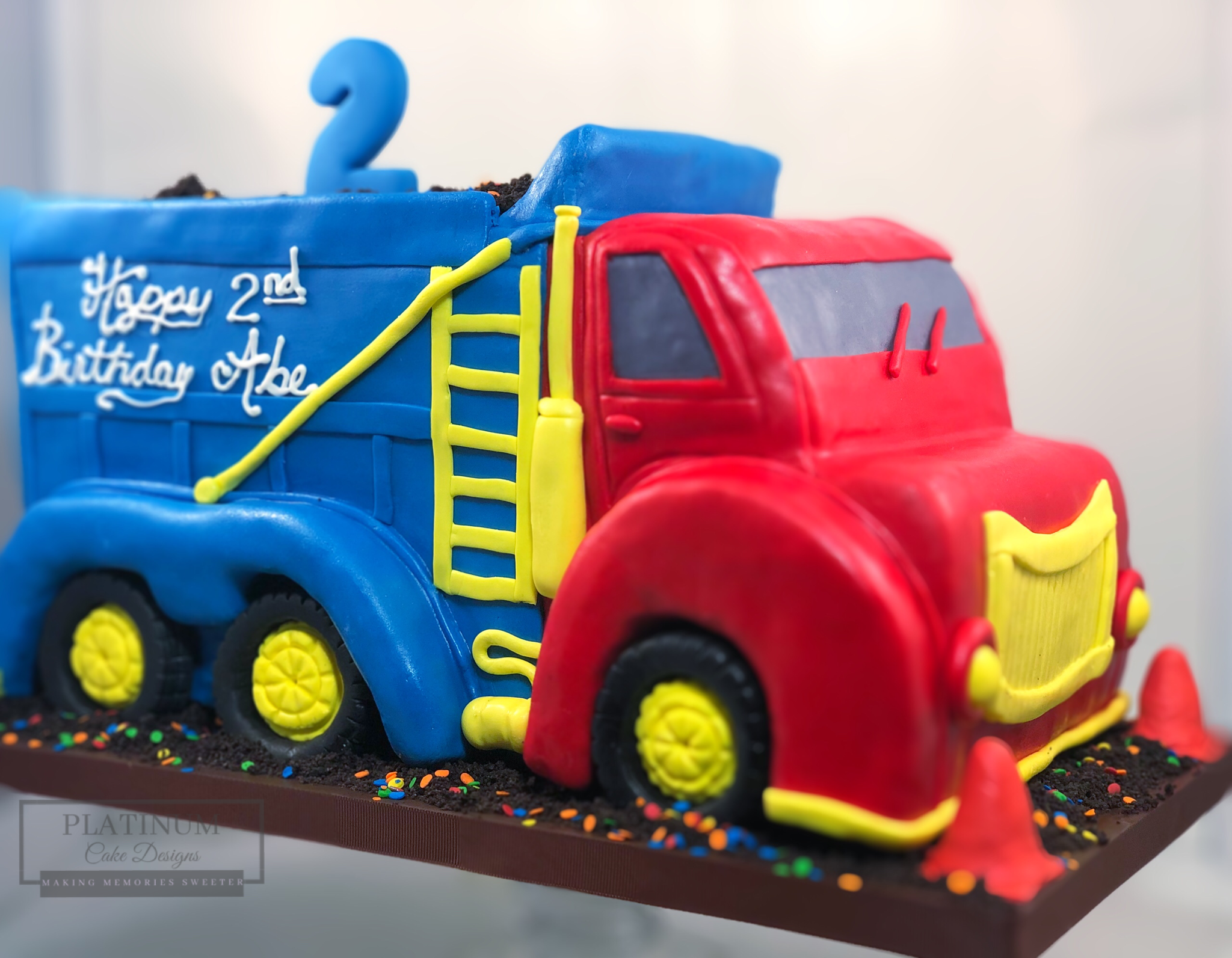 Sculpted Dump Truck 2nd birthday cake passenger side2.png