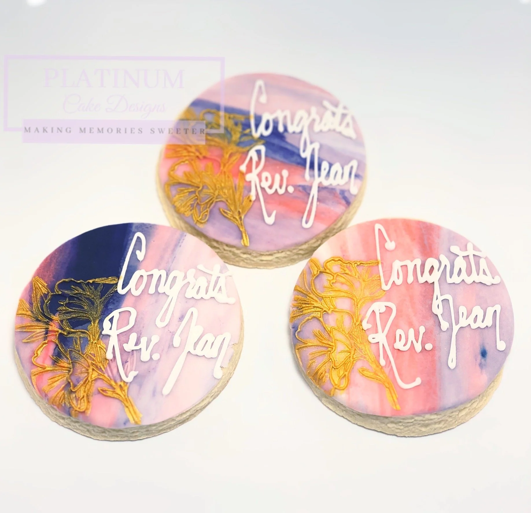 We created these sugar cookie to celebrate a student's graduation from ministerial school.  We gave her these flowers by adding an embossed flower hand painted in gold. 