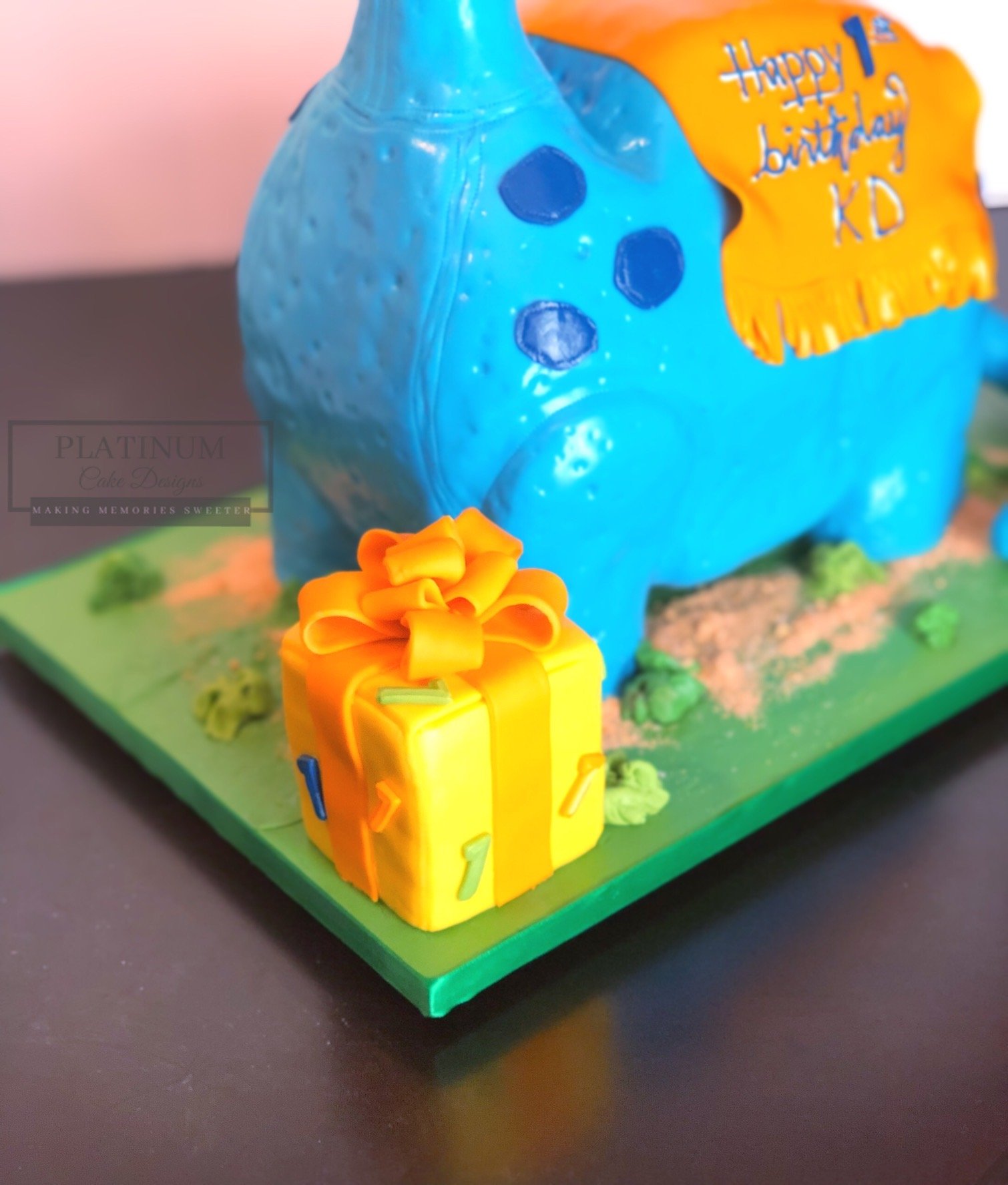 Toy Sculpted Dinosaur 1st Birthday Cake Closeup.JPG