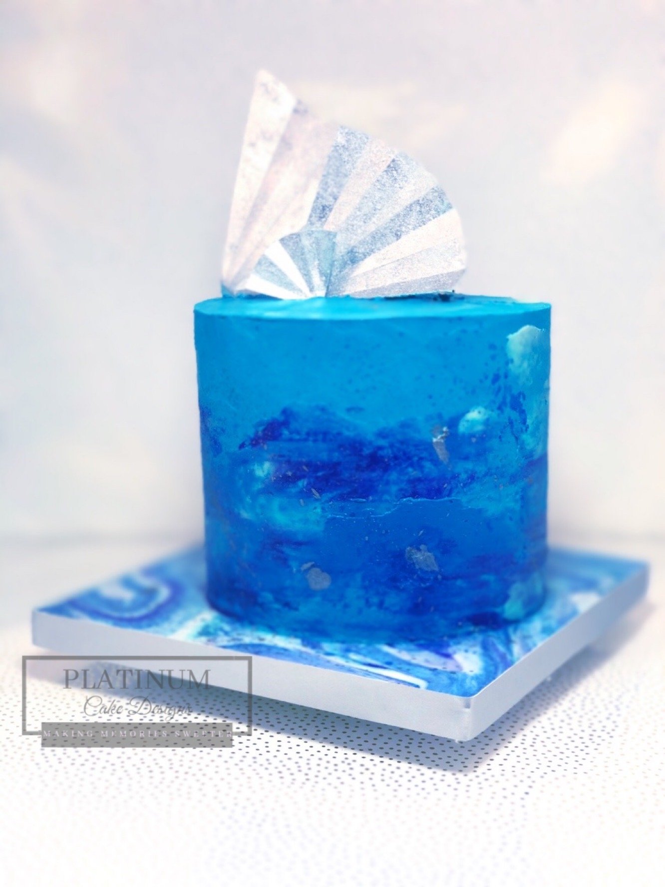 Silver wafer paper celebration cake.JPG