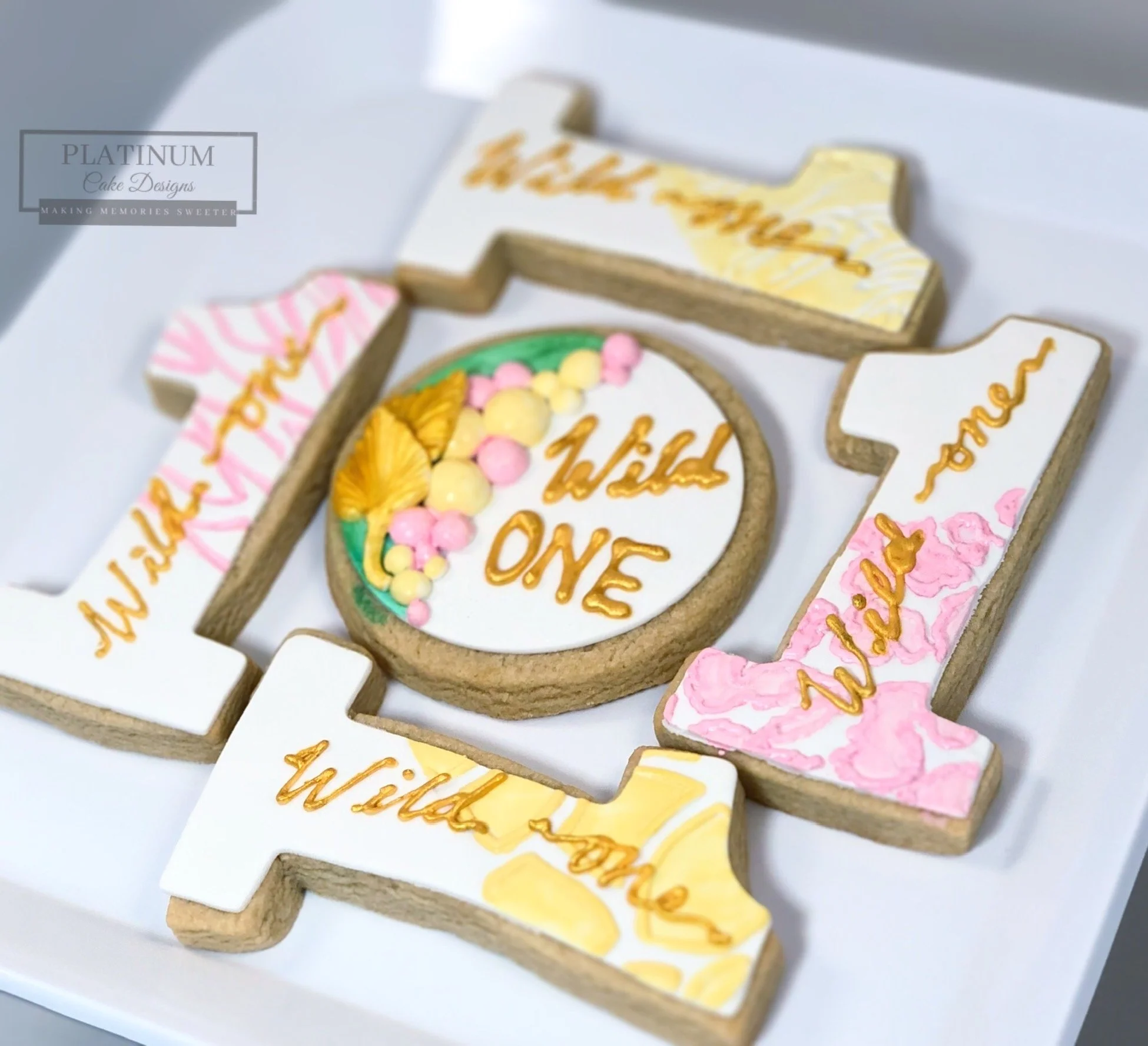 Platinum Cake Designs created these wild one cookie set for a little one's first birthday.  We embossed these cookies to texture with different prints like giraffe, cheetah, tiger, and crocodile.