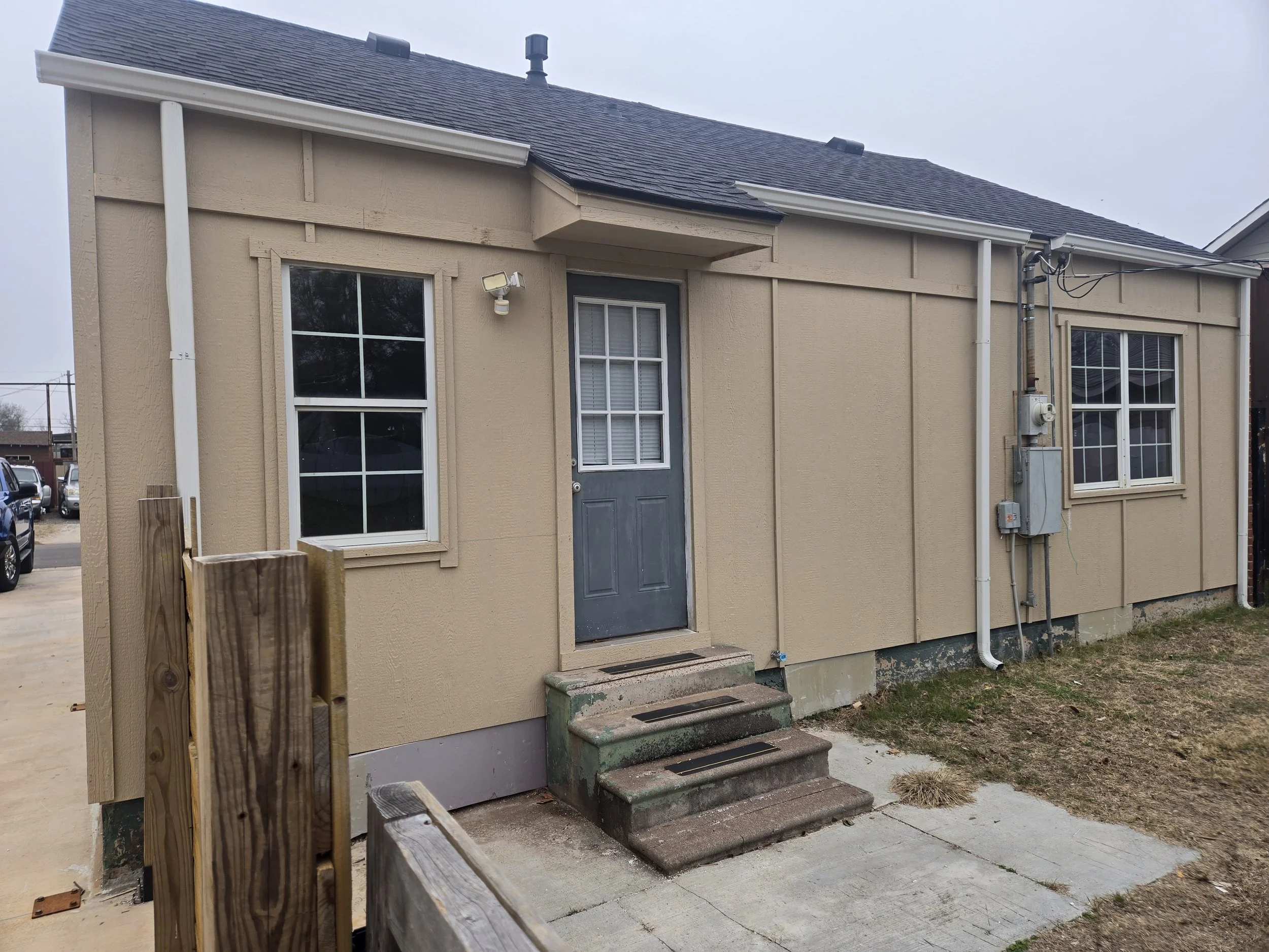 back view of a home with board and batten siding