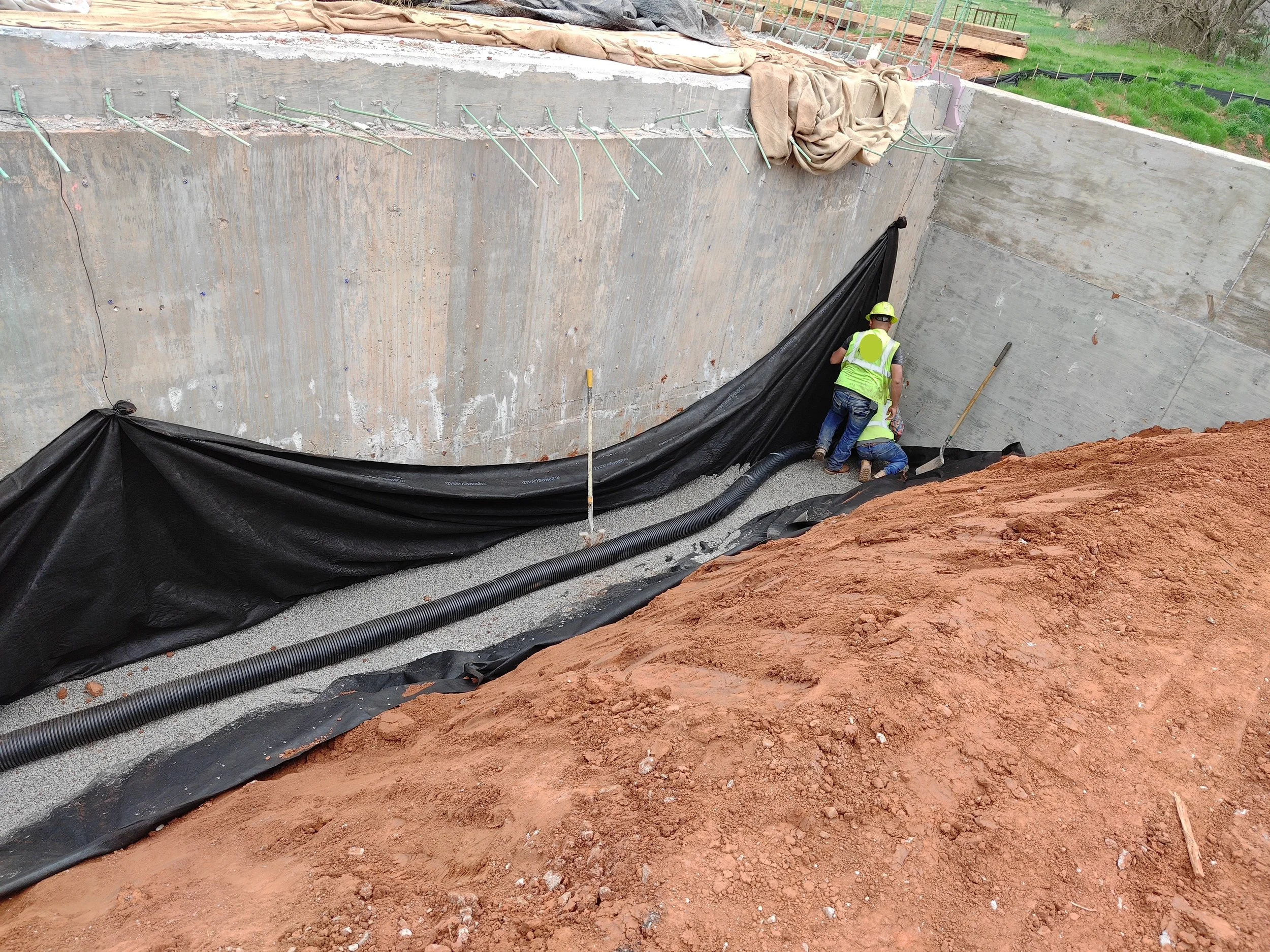 6 inch French drain place under bridge seat and approach