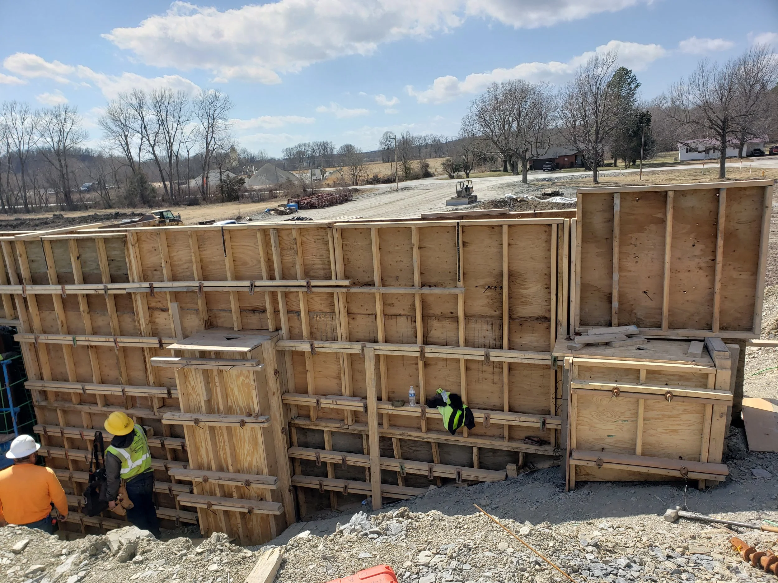 forms for wing walls with cutouts for columns, pile encasements