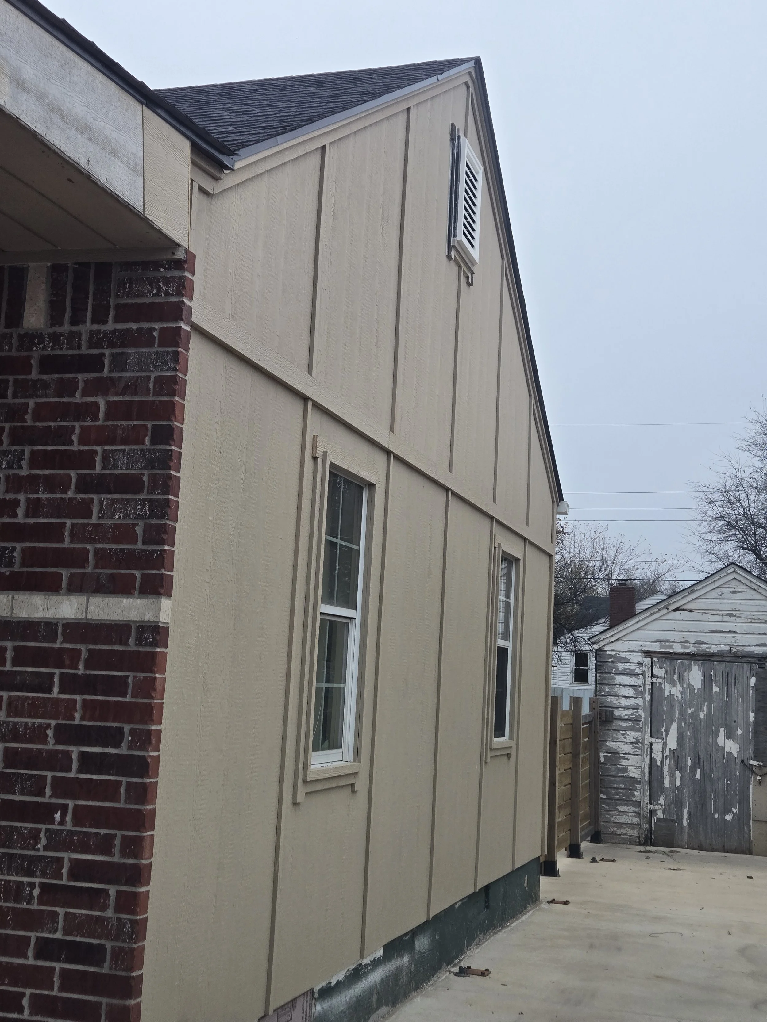 side view of a home with board and batten siding installed