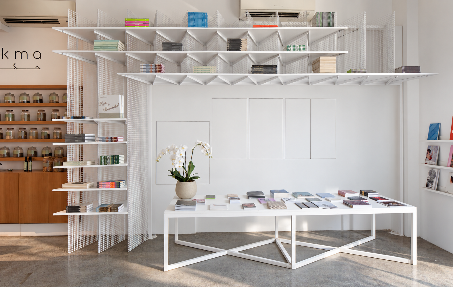 Set in the Al Serkal creative district in Dubai, the Third Line Gallery Library draws from existing industrial materials to revive a legacy gallery following the pandemic. A dynamic new crenellated shelving system made from the same wire mesh railing