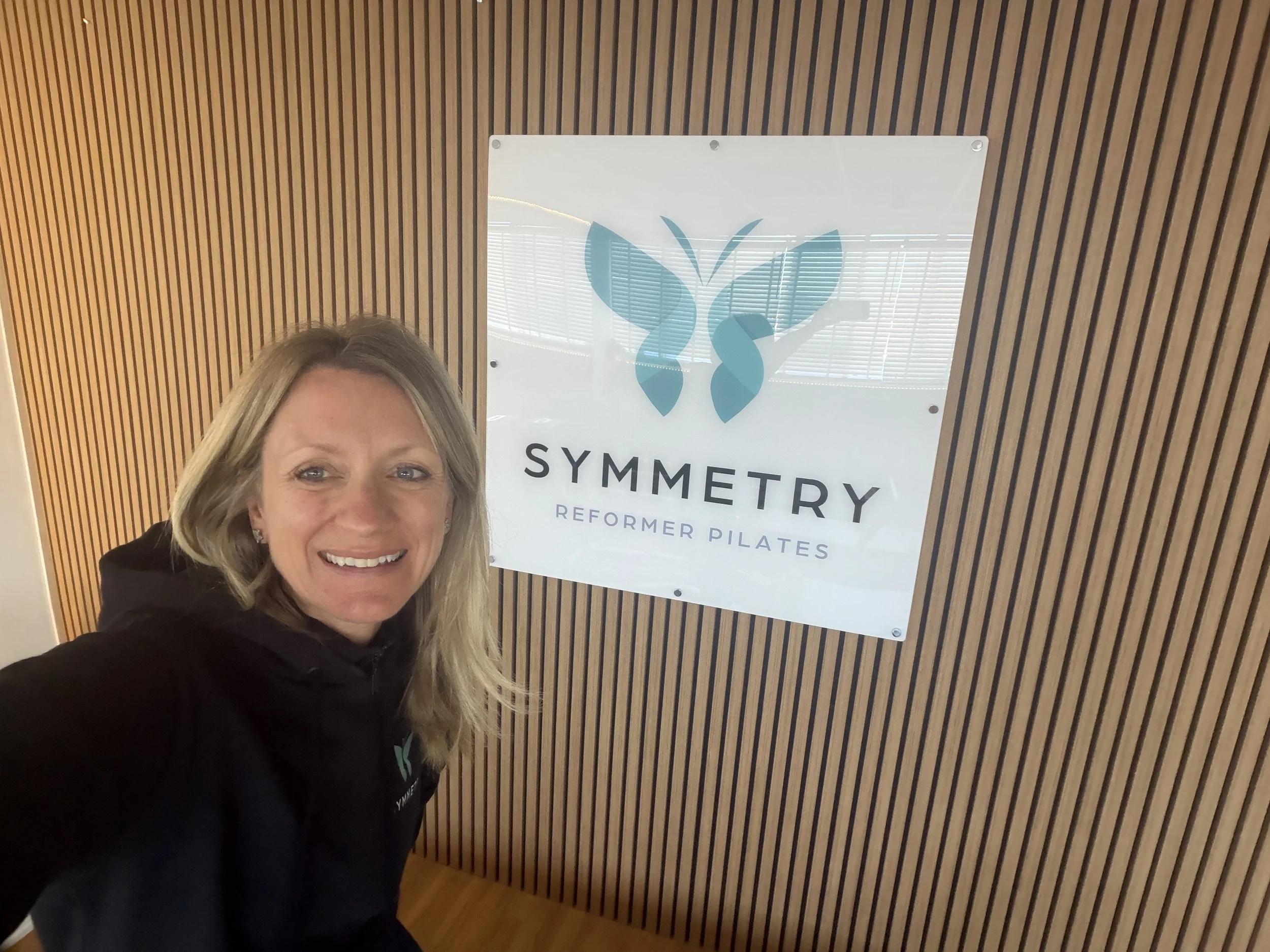 Why I Love Teaching Reformer Pilates and Why It Matters at Symmetry