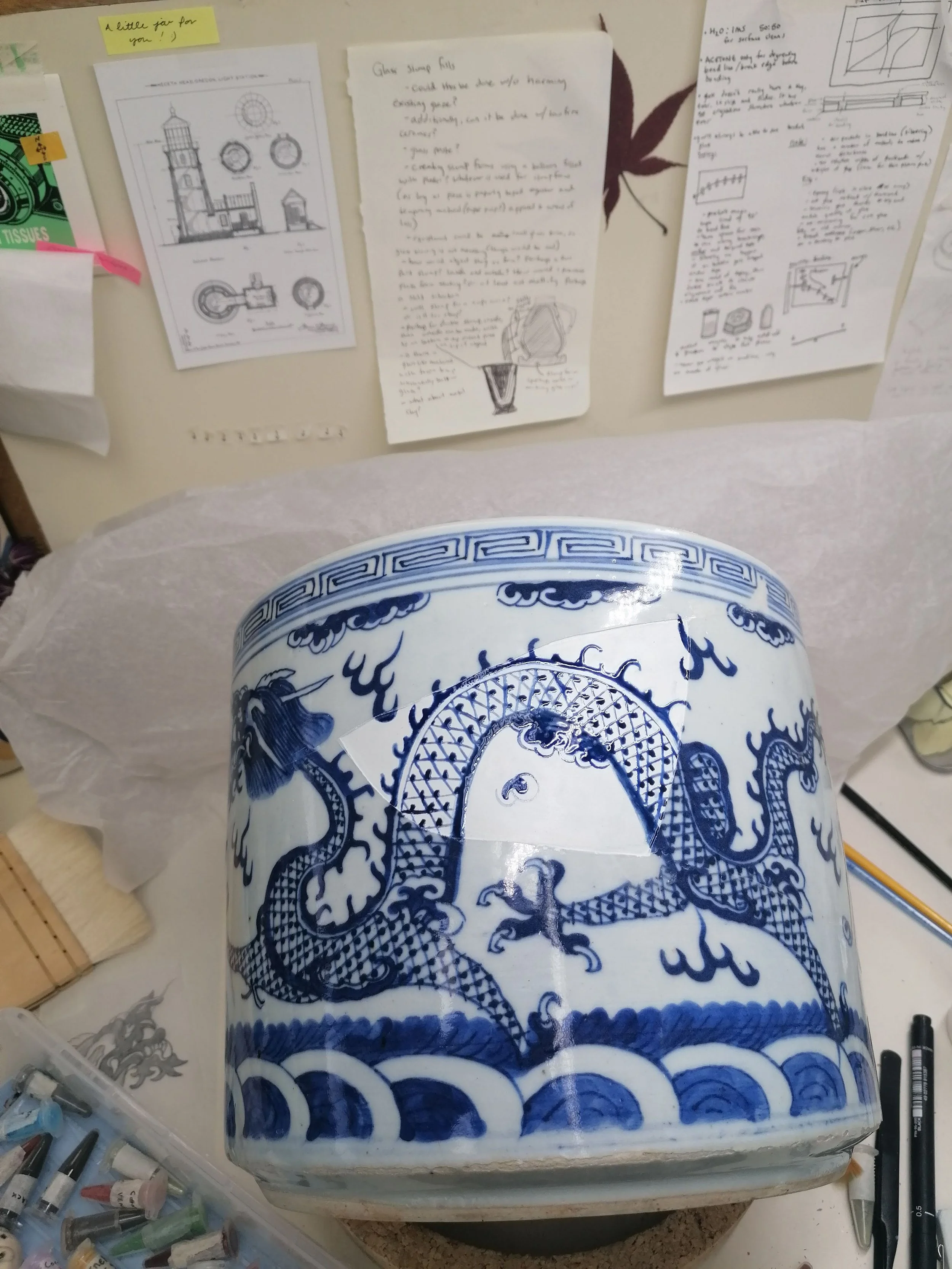 Dragon pot WIP creating a layered retouching to mimic the visual depth of the cobalt underglaze and celadon glaze.