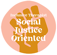 Graphic with a large raised fist in a dark orange color against a pink background, surrounded by all-caps white text stating 'Inclusive Therapist' and 'Social Justice Oriented'.