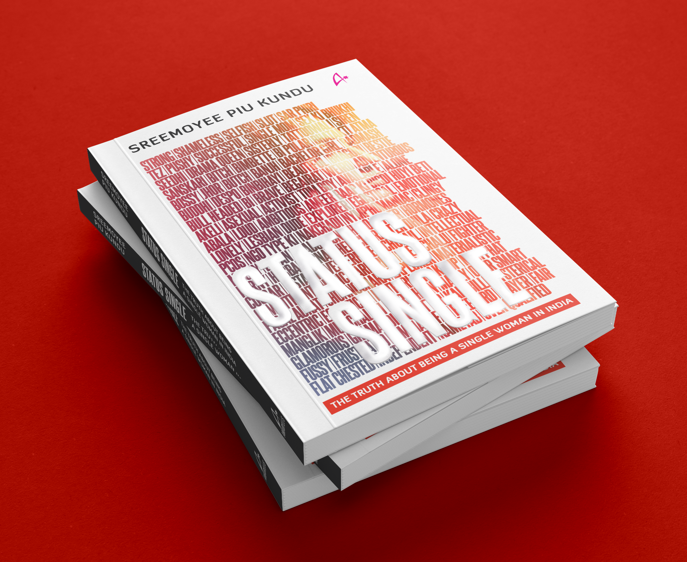 Stack of books titled 'Status Single' with a red and white cover design, placed on a red background.