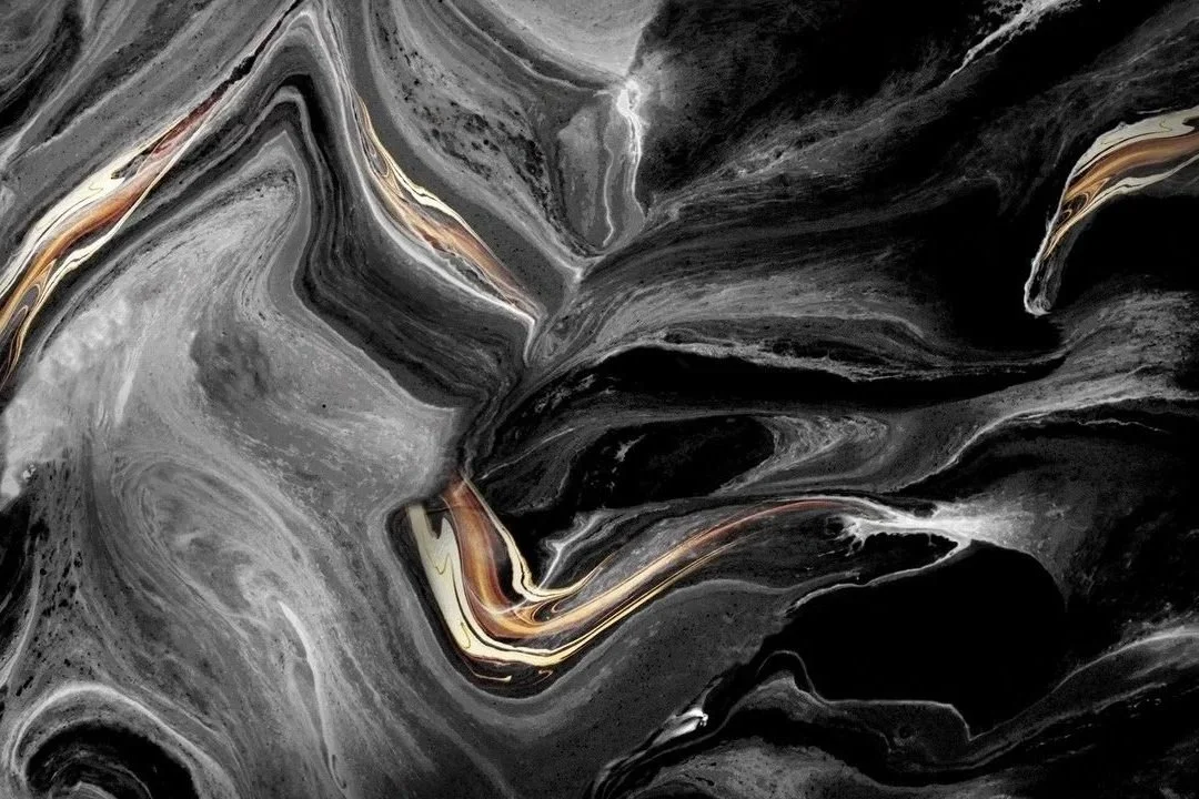 Close-up detail of epoxy flake flooring showing texture, color blend, and polyaspartic finish.