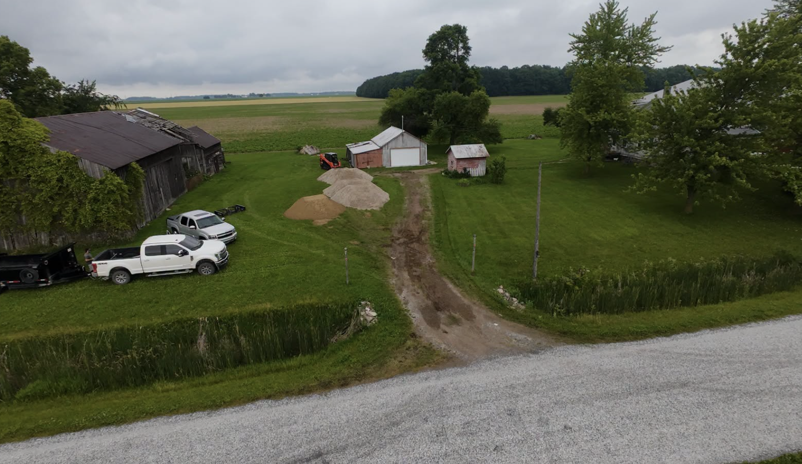 Residential land clearing project completed in Washington Township, MI, preparing acreage for development and landscaping.