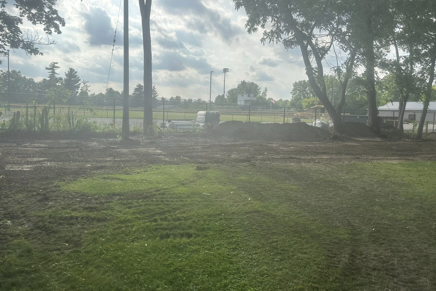 Land clearing and site preparation project completed in Port Huron, MI, preparing the property for future construction and development.