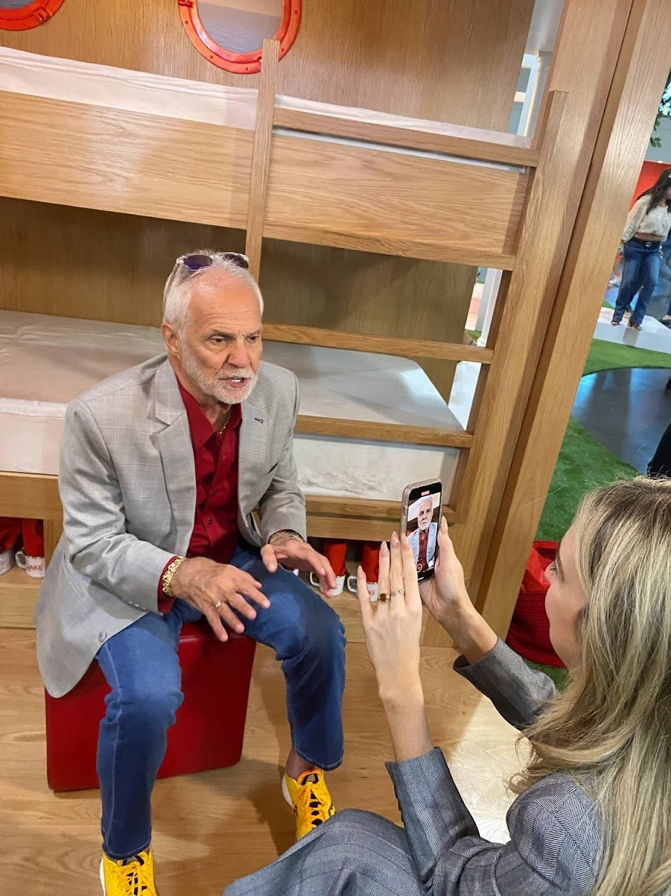 Captain Lee from Below Deck filming for E! News Instagram Stories