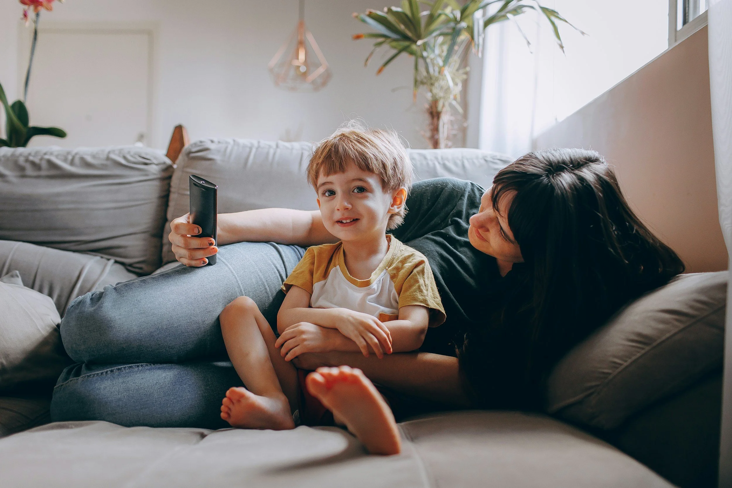 “Parent coaching session with occupational therapist supporting a neurodivergent child through play-based sensory activities.”
