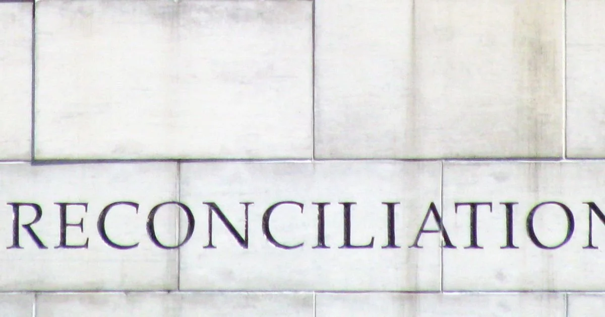 Florida business owner reviewing MCA reconciliation requests, bank statements, and merchant cash advance agreement documents.