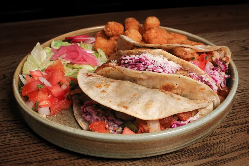 A plate of Muertos Cantina tacos