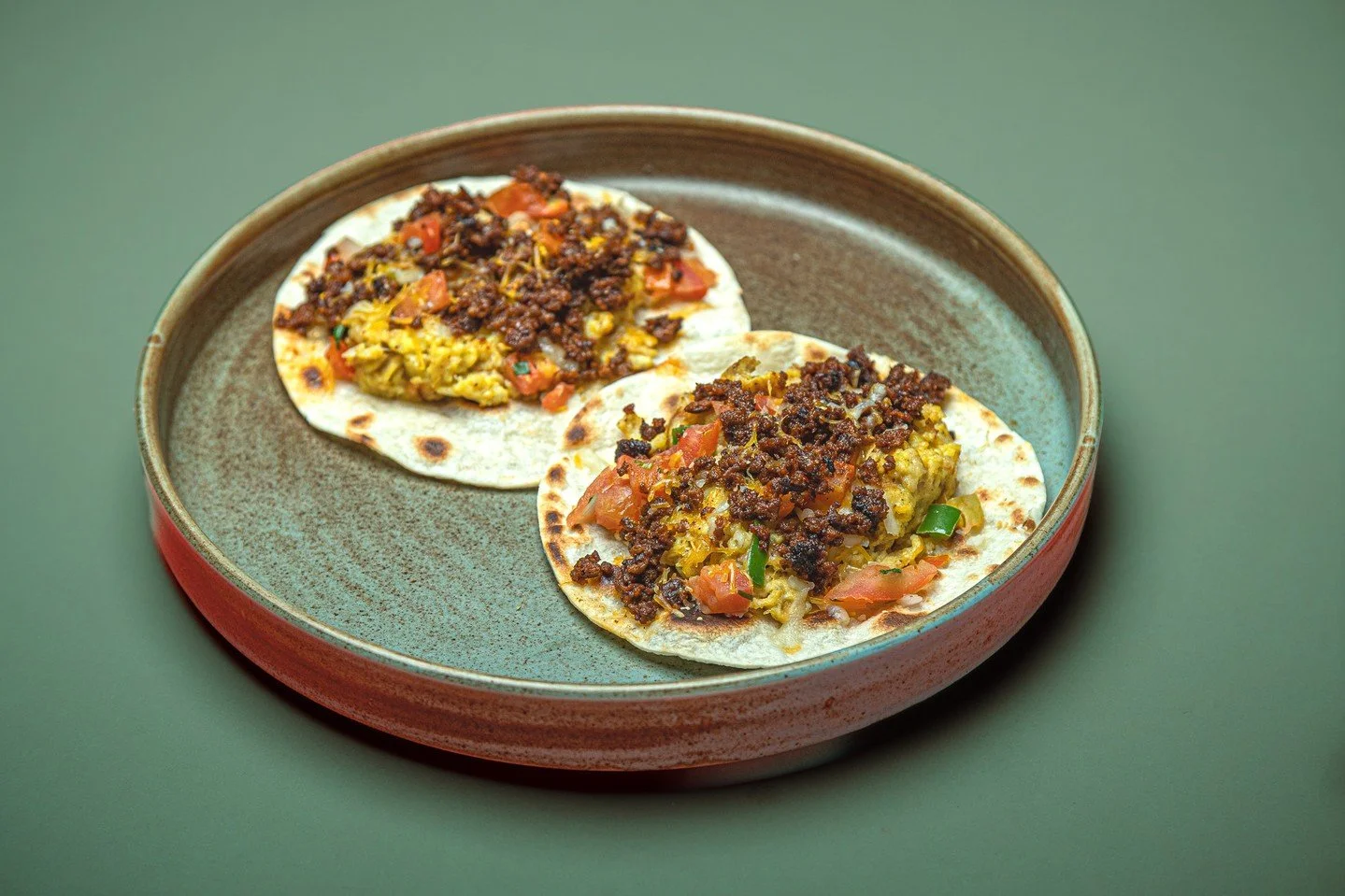 They told me breakfast burritos are all the same.

Then they tried ours.

A breakfast burrito at most SLC spots: $12-15.
A breakfast sandwich combo: $10-13.
A Muertos Breakfast Taco: $2.

Box of 10 for less than $20. Chorizo &amp; egg. Bacon &amp; eg