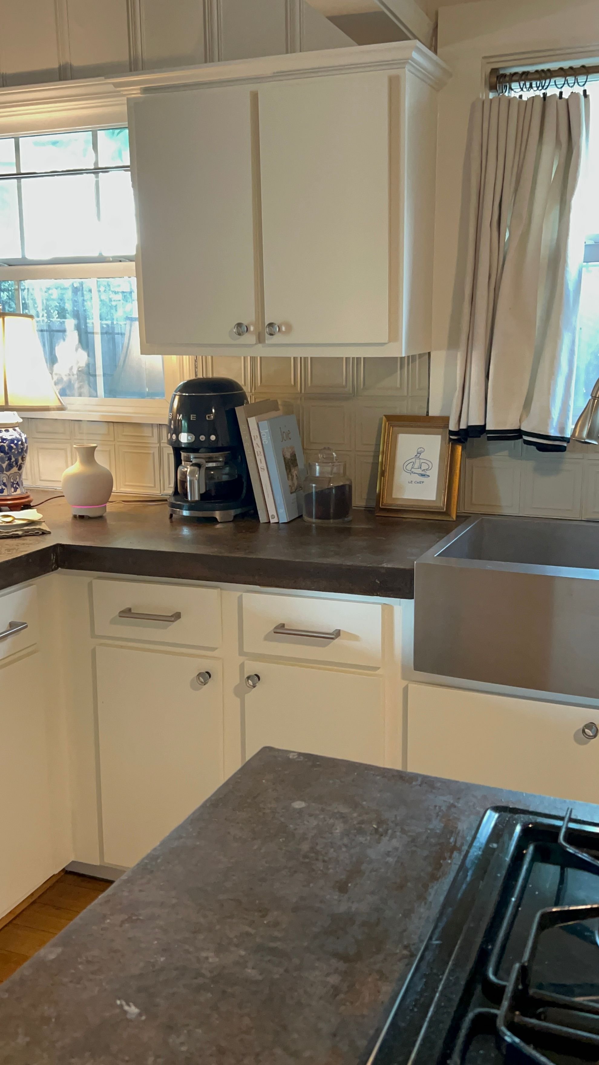 The concrete counter tops were such a great contrast to the more feminine aspects of this home.