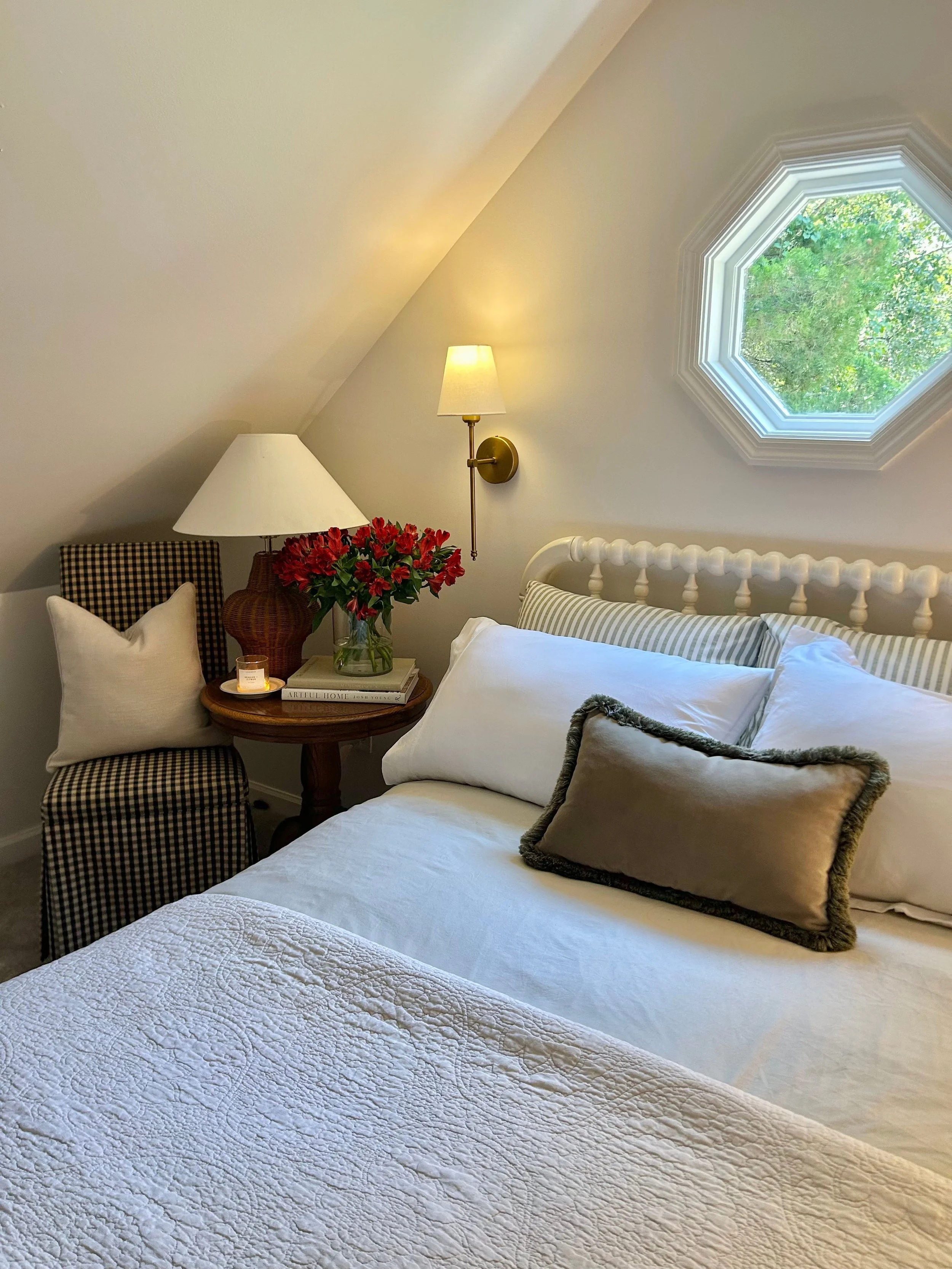 I have such a big dreams for this little above the garage attic, but till then its an extra cozy guest room.