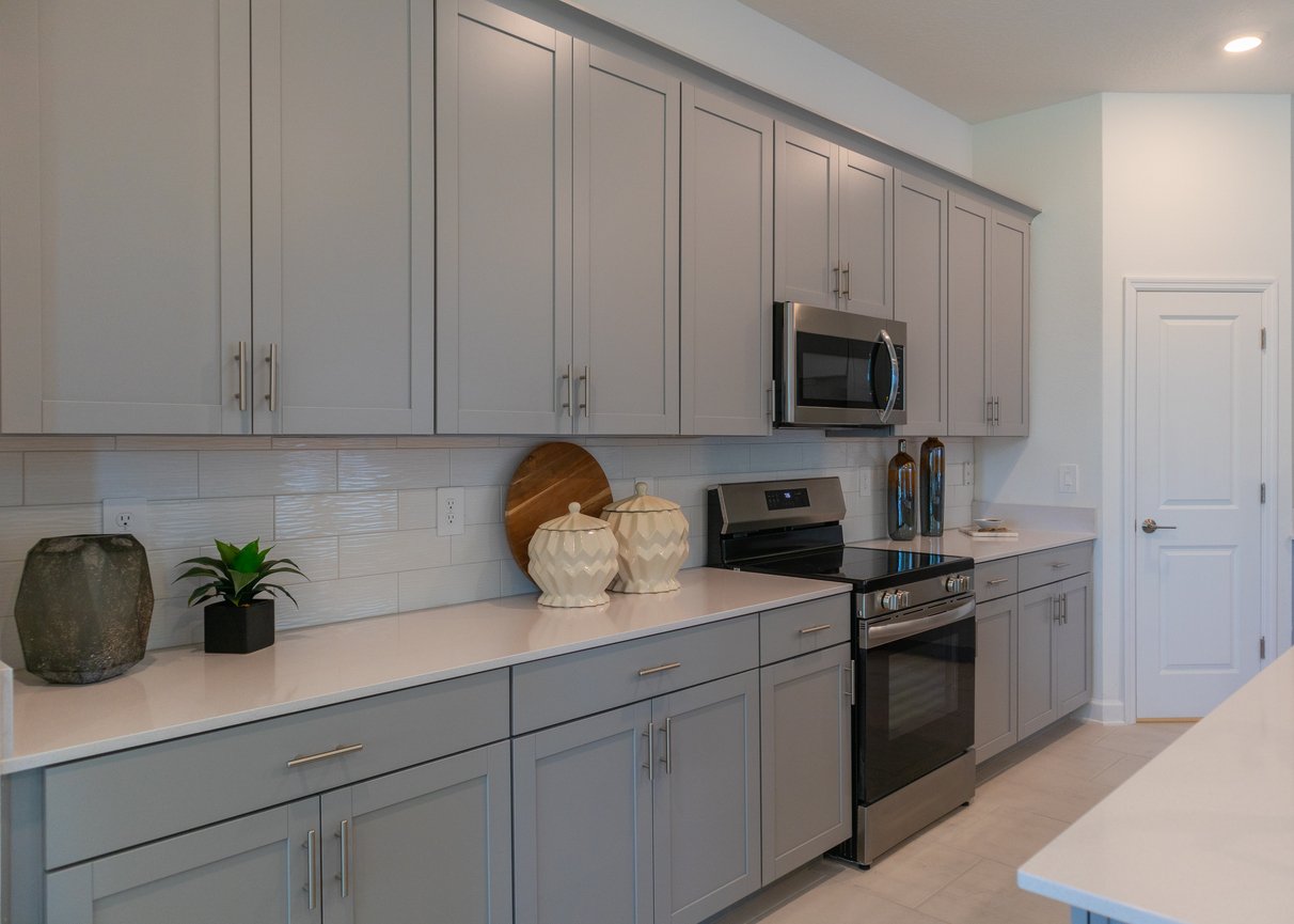Refinished kitchen cabinets in blue