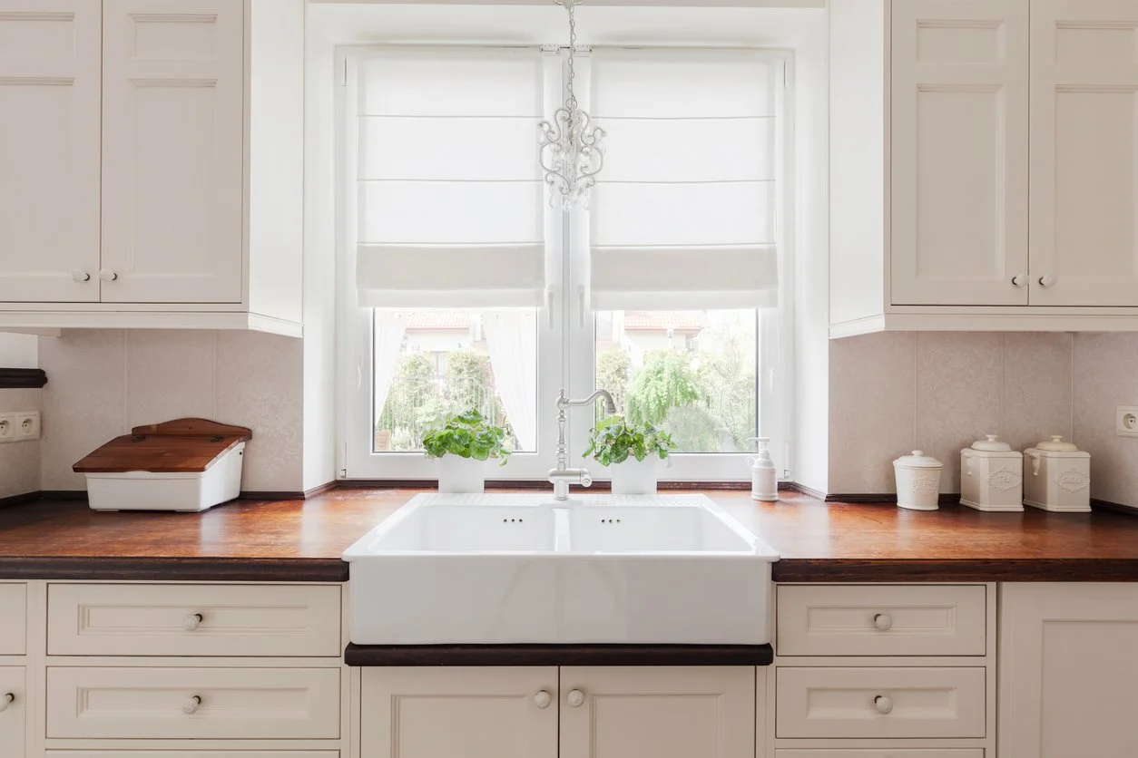 Leon's Custom Painting Refinished Cabinets White with Farmhouse Sink