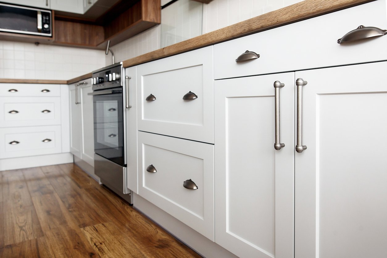 Leon's Custom Painting Refinished Cabinets Farmhouse White with Black Hardware