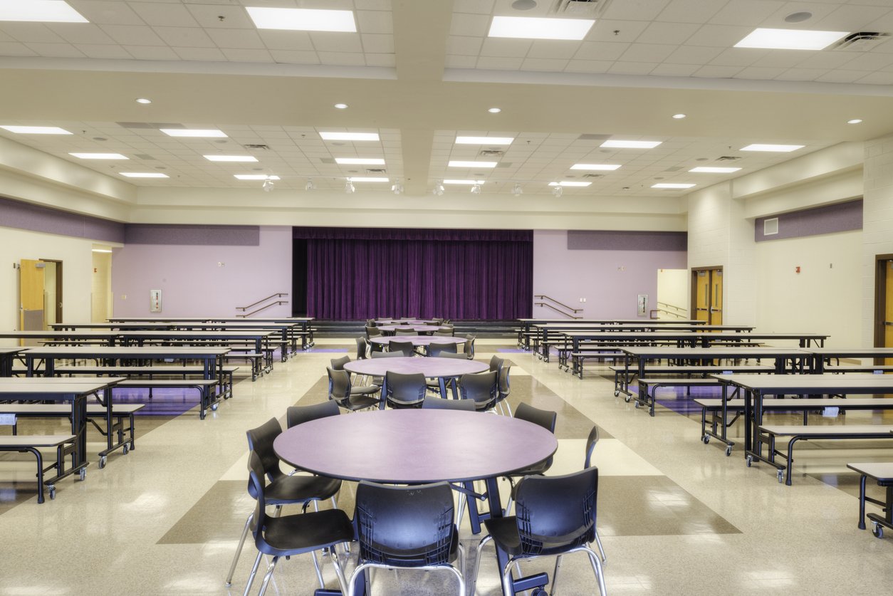 School cafeteria with purple accent walls