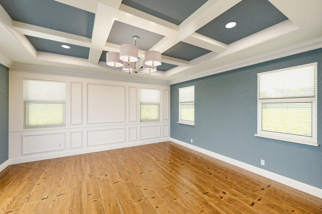 Livingroom with crown molding and wainscoting