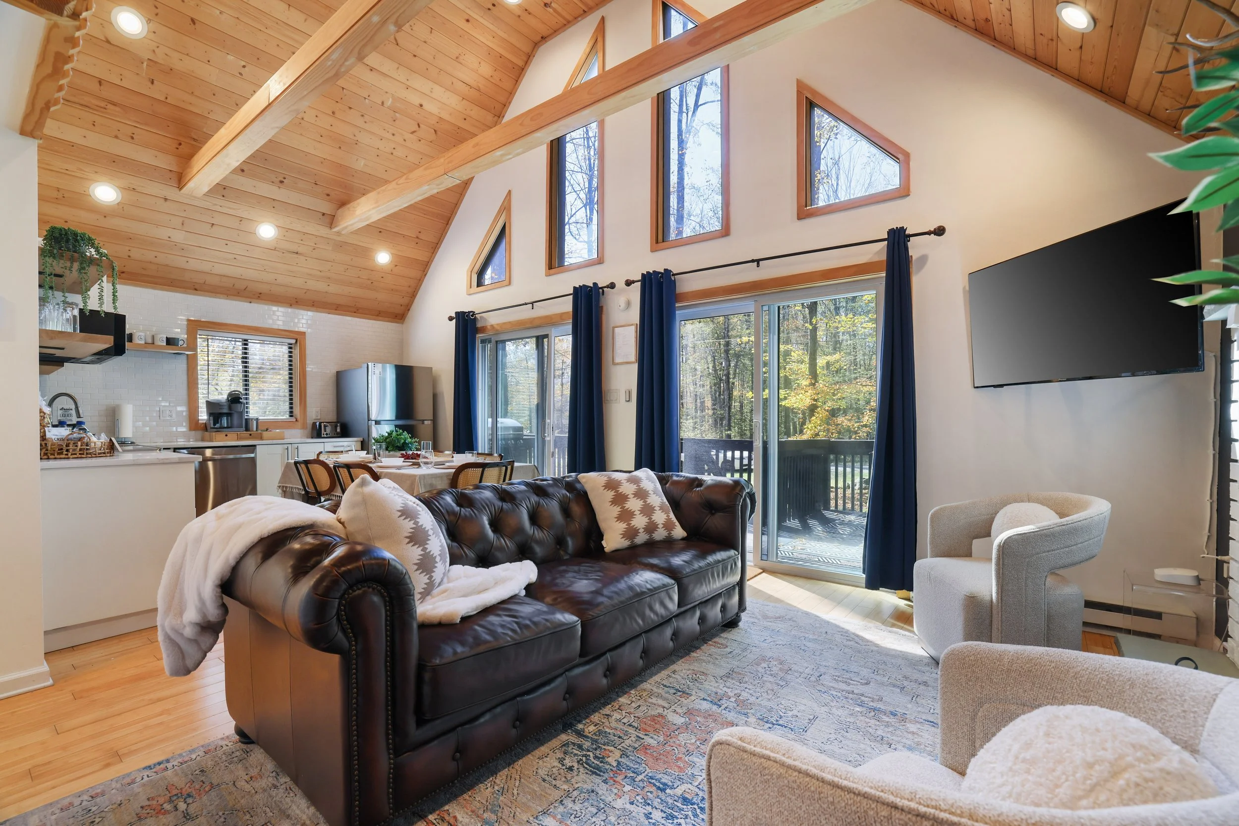 Enjoy two spacious living spaces, fireplace and games at Casa Camilo in Arrowhead Lake