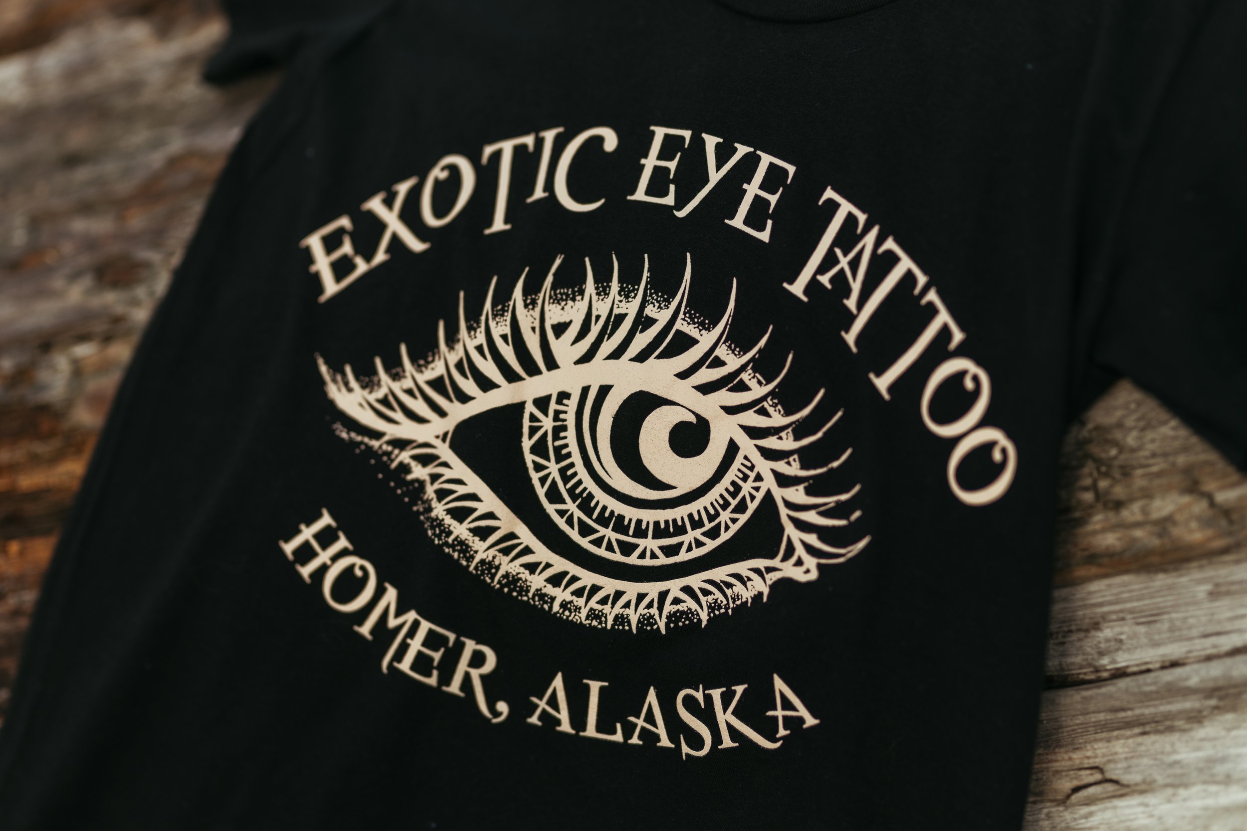 tee_elementaleye_unisex_black_detail_frontprint (1).jpg